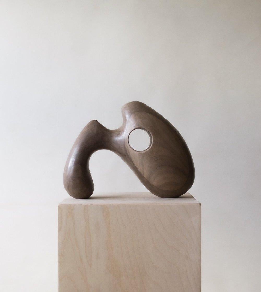 Genii Sculpture by Chandler McLellan
Limited Edition of 8 Pieces.
Dimensions: D 12.7 x W 24.1 x H 17.8 cm. 
Materials: Walnut.

Sculptures will be signed and numbered on the bottom of the base. Wood grain will vary, wood species will not. Letters of