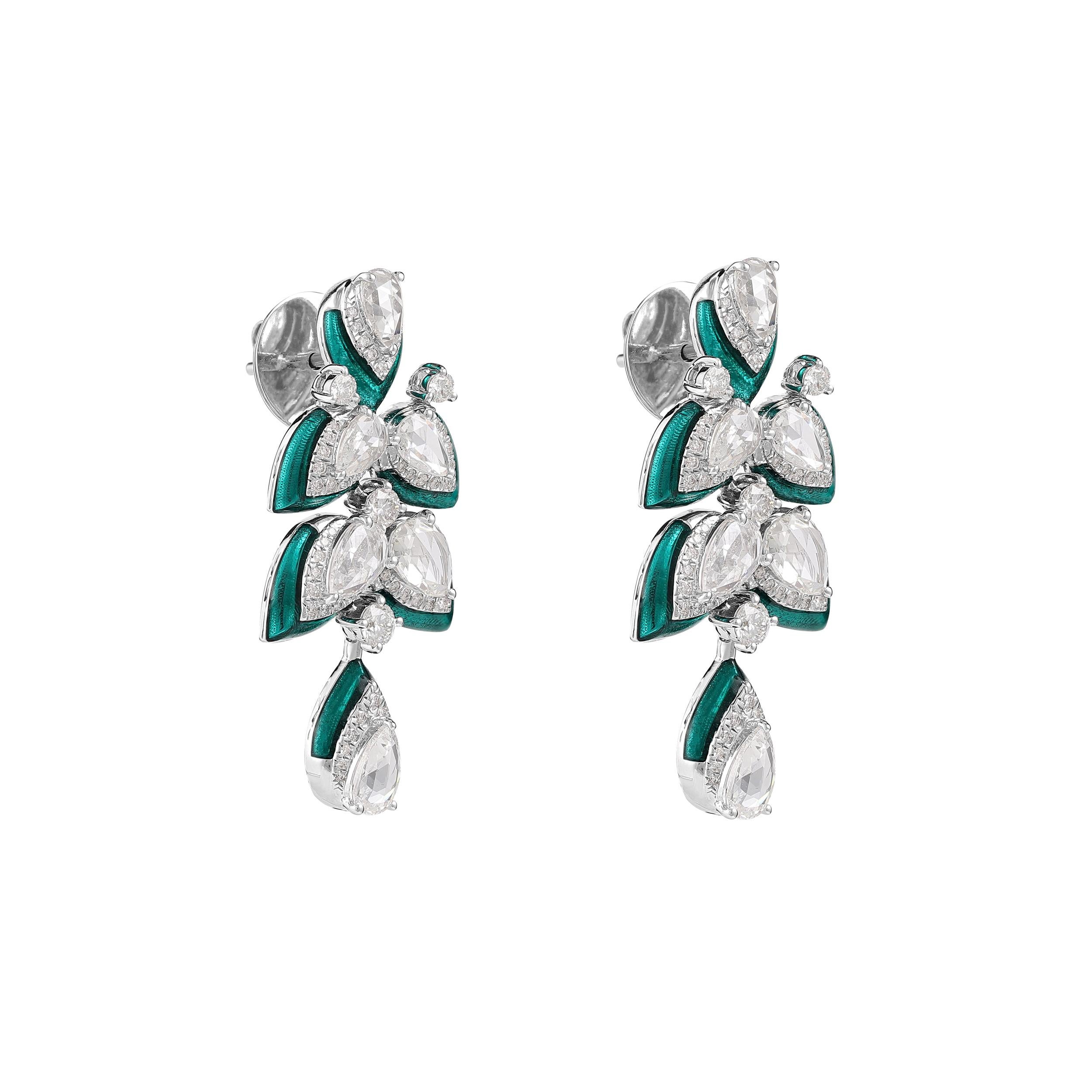 0.25 Carat Pear in the shape of a leaf, accented with rounds and Enamel to elevate the style. Total Carat weight of 2.92. Made with 10.32 grams 18K white gold.

Available in any of the Kamyen signature colors. We at KAMYEN use a cold enameling