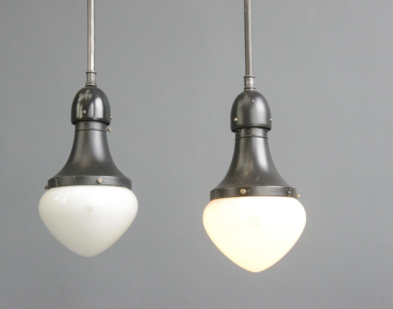 - Opaline glass shades.
- Black painted steel tops.
- Takes E27 fitting bulbs.
- Marked 