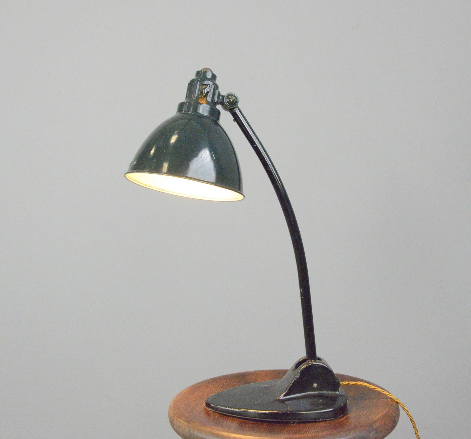 Kandem model 573 table lamp Circa 1920s

- Pressed steel shade
- 