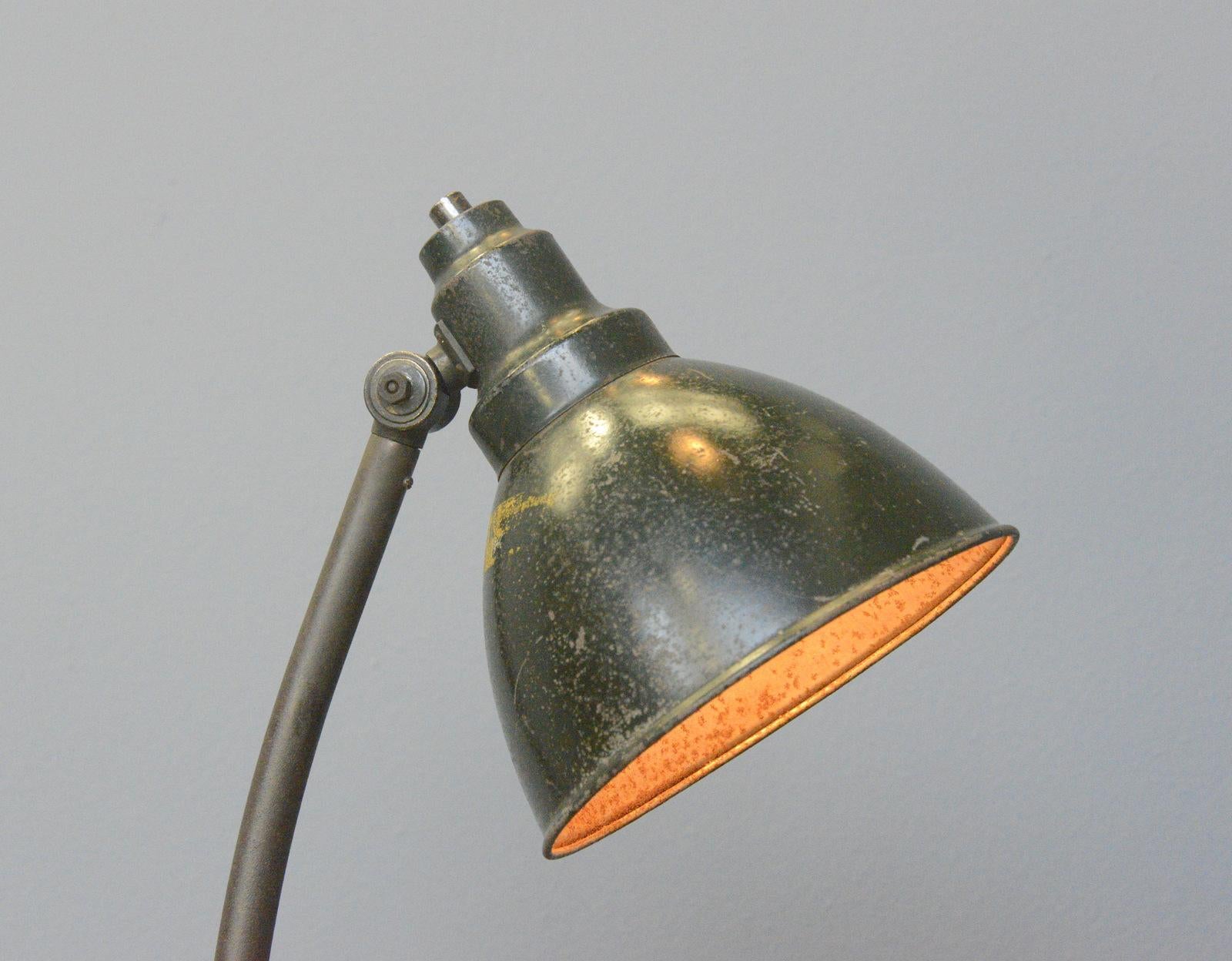 Kandem Model 573 table lamp Circa 1920s

- Pressed steel shade
- Steel arm
- Original On/Off toggle switch on the shade
- Cast iron base
- Original paint
- Takes E27 fitting bulbs
- Model 573
- Produced by Körting & Mathiesen, Leipzig
-