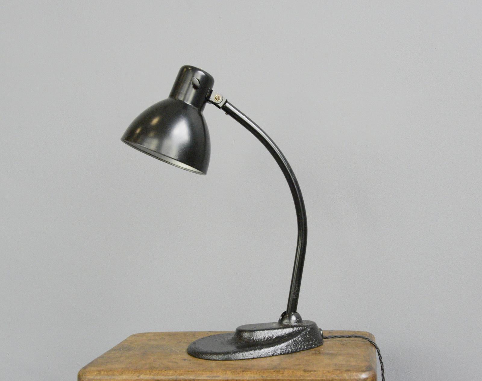 Kandem Model 967 by Hin Bredendieck, circa 1920s

- Cast iron base
- Adjustable curved steel arm
- Steel shade 
- Original toggle On/Off switch 
- Designed by Hin Bredendieck
- Produced by Korting & Mathiesen, Leipzig
- German, 1920s
-