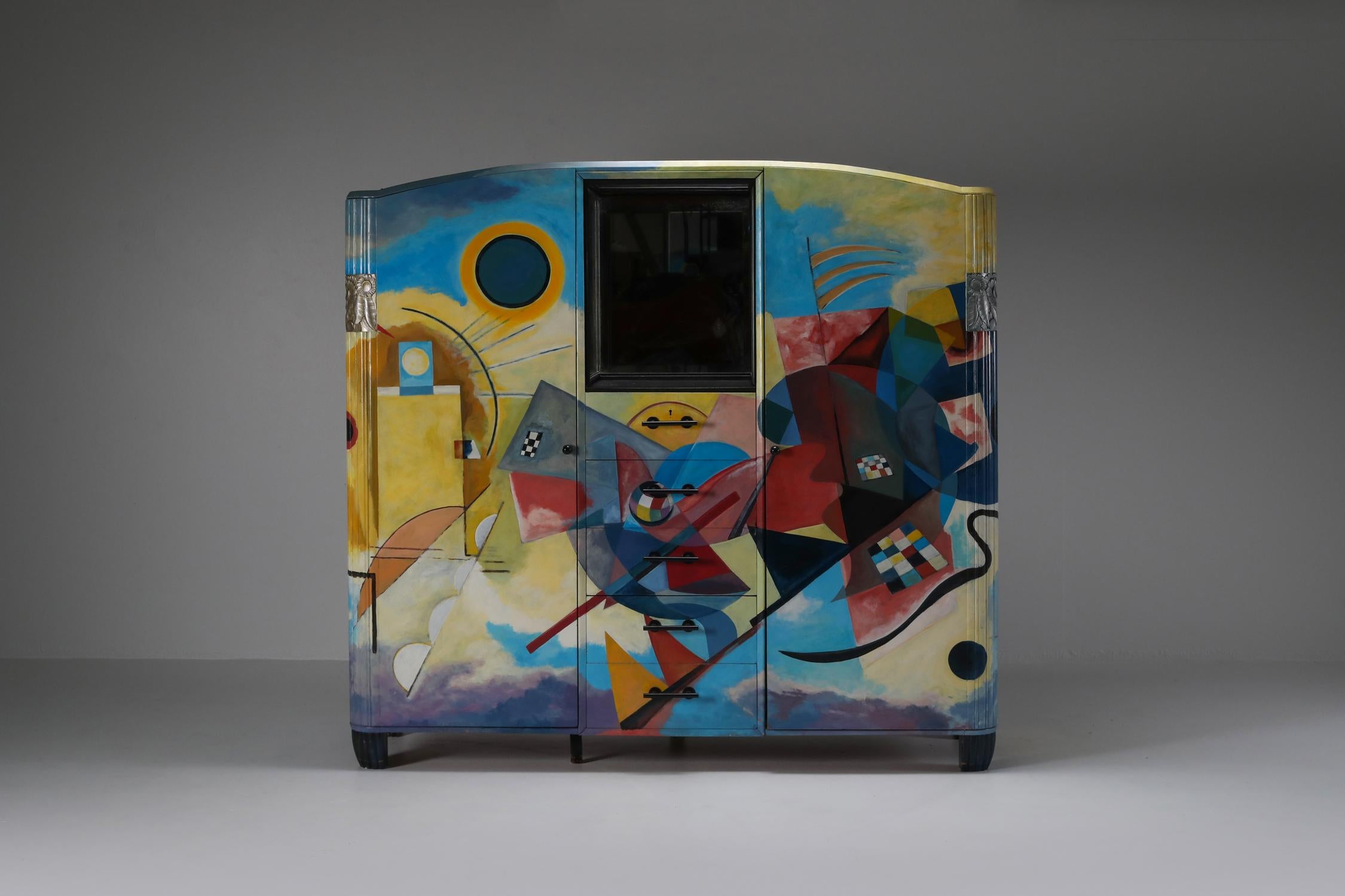 Art Deco cupboard hand painted in the style of Kandinsky, Belgium 

There's a true art history story to be told through this piece.
In the time of his Avant Garde art space, Peers painted this storage piece in the manner of Kandinsky to be able