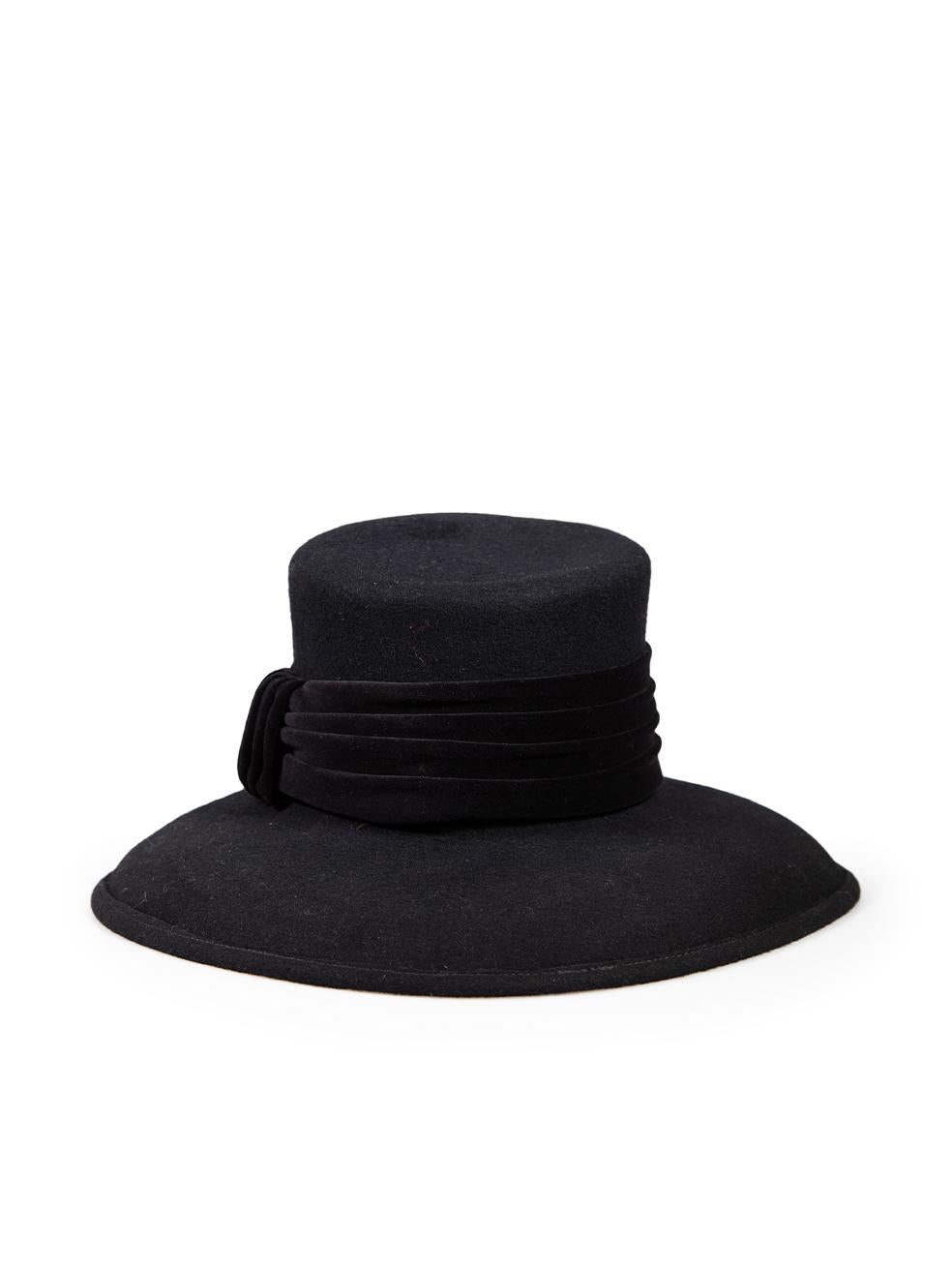 CONDITION is Very good. Hardly any visible wear to hat is evident on this used Kangol designer resale item.
 
 
 
 Details
 
 
 Vintage 
 
 Black
 
 Wool
 
 Fedora hat
 
 Velvet bow detail
 
 
 
 
 
 Made in UK
 
 
 
 Composition
 
 100% Wool
 
 
 
