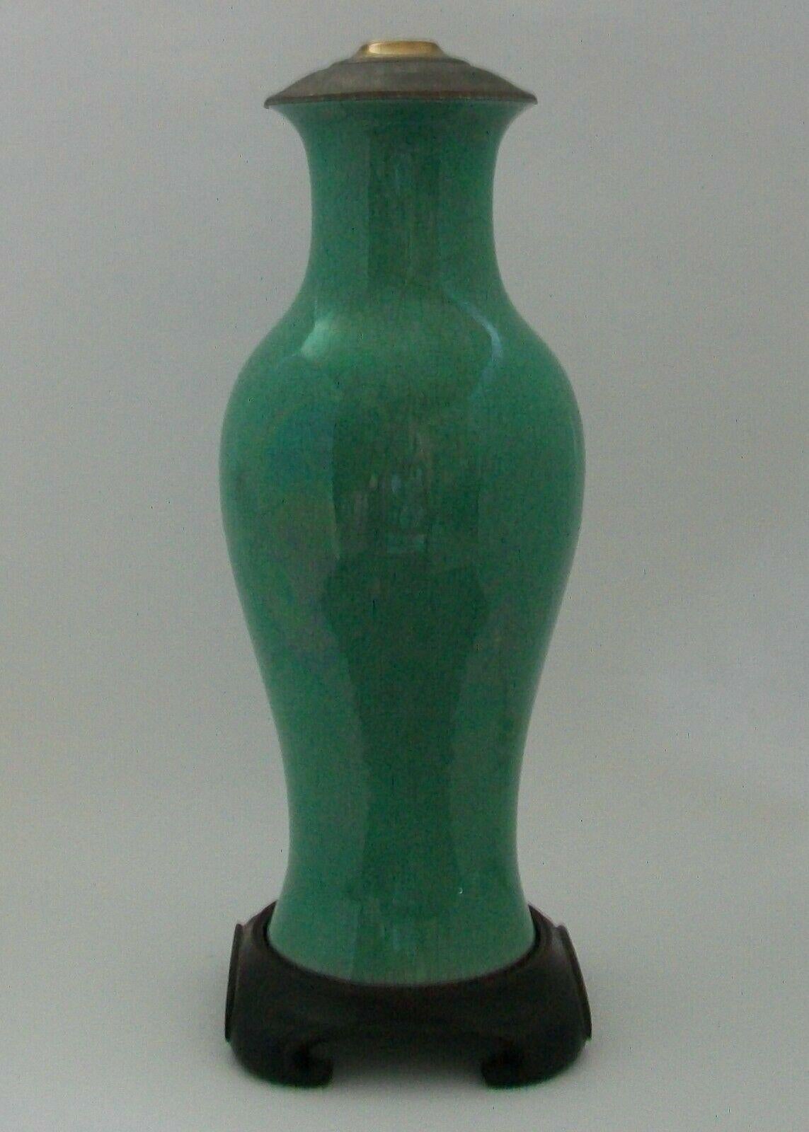 Rare Kangxi Dynasty (1654-1722) apple green over white crackle glazed baluster shaped ceramic vase/lamp - white crackle glazed interior and base - large size - electrified/drilled mid 20th century - vintage Chinese hardwood base - vintage brass cap