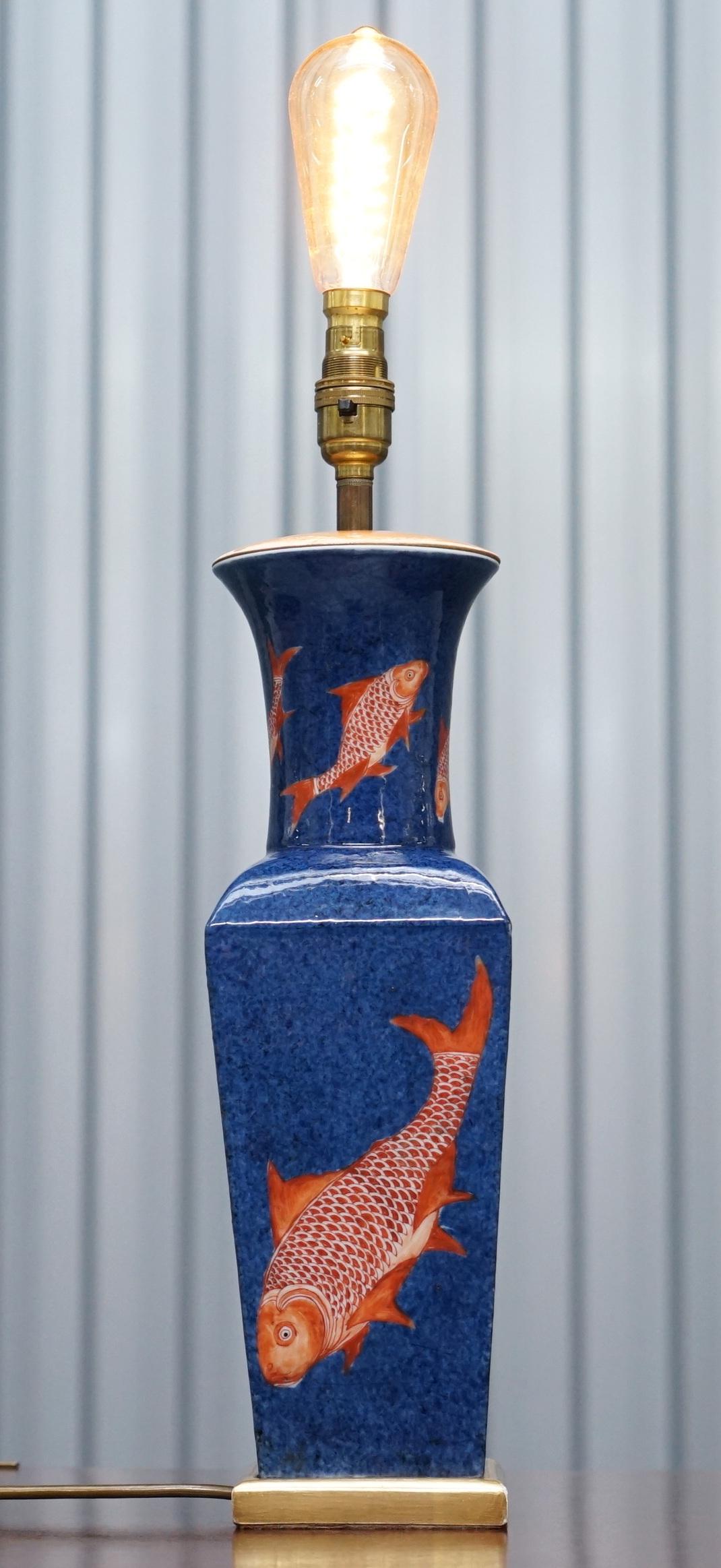 We are delighted to offer for sale this exceptionally rare Kangxi period circa 1662-1722 Chinese carp Powder blue ground iron red gilt vase converted to a lamp by the antiques department of Asprey Bond street in the 1970s

These vases are highly