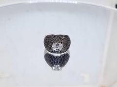 Kanjimull Black Diamond Bombe Ring with a 0.92 ct Oval White Diamond
