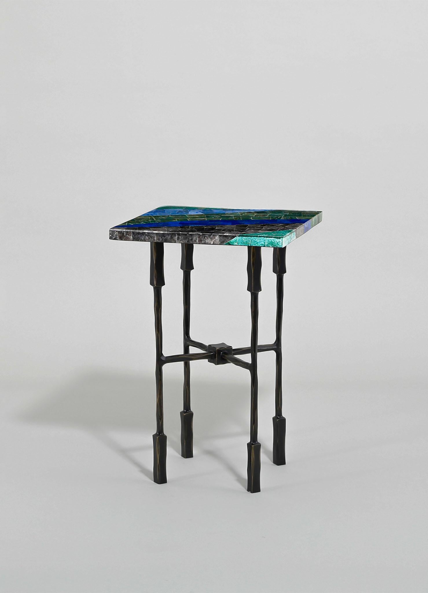 Kannur Side Table Medium in Brass with Semi Precious Stones, Viya by Vikram Goyal

Crafted from cast brass and adorned with semi-precious stones, this collection pays homage to the diverse hues of Indian landscapes. From the azure blues of oceans