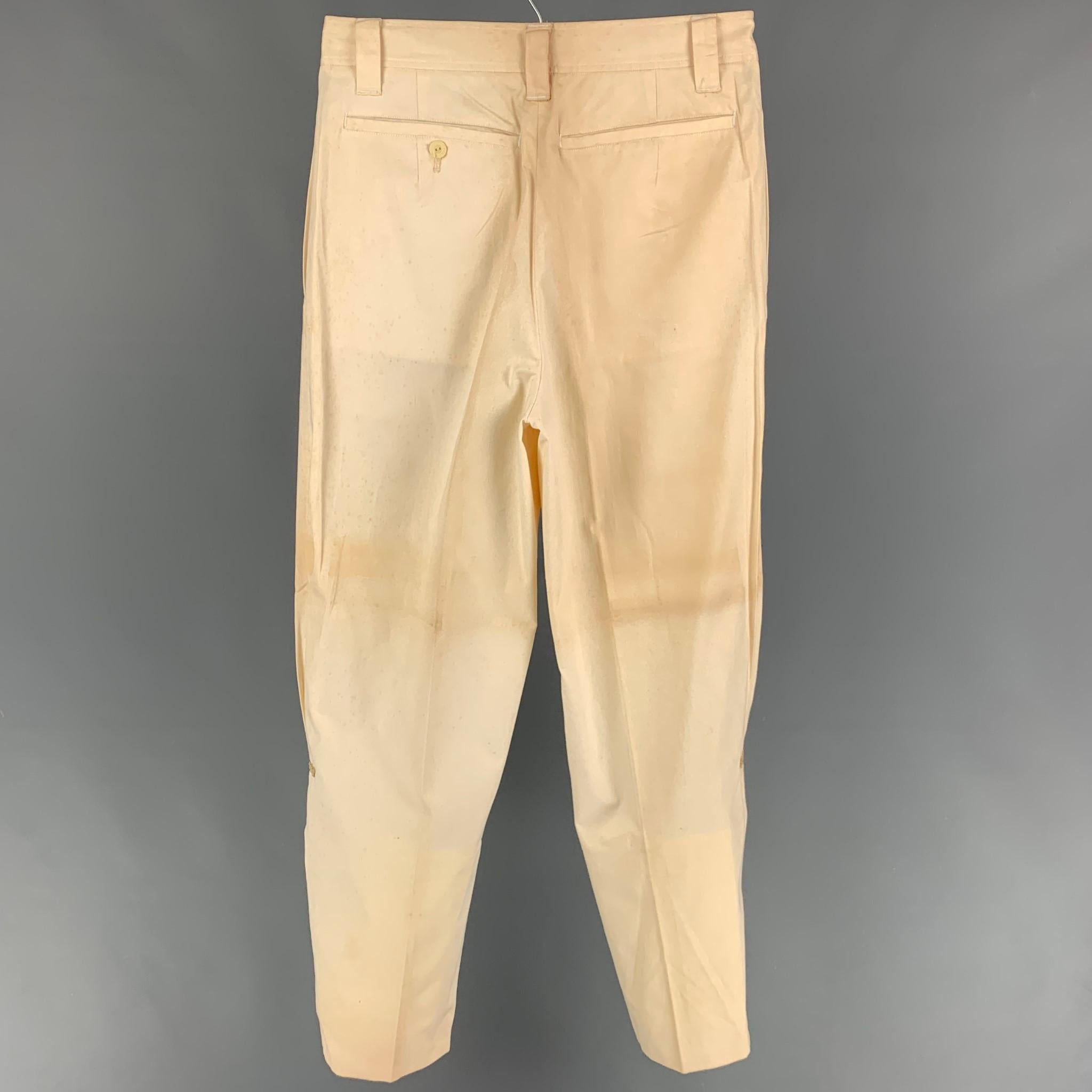 Vintage KANSAI MEN pants comes in a cream cotton with a gold glitter trim featuring a pleated style, high waisted, and a zip fly closure. Includes tags. Made in Japan. 

Very Good Pre-Owned Condition.
Marked: 30

Measurements:

Waist: 29 in.  