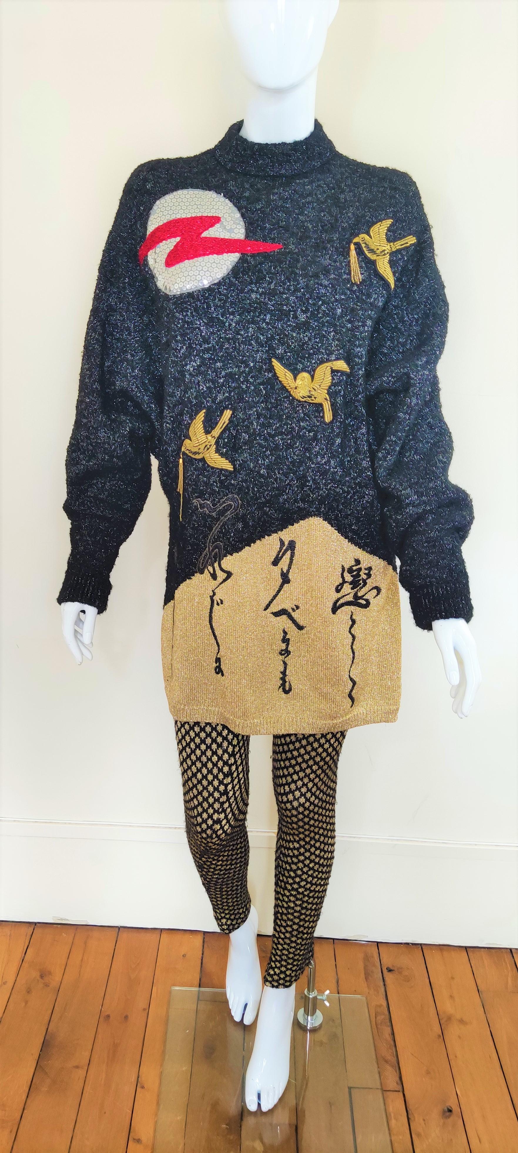 RARE set by Kansai Yamamoto!
Dress/pullover + pants.
Pattern: night with red moon and birds. 2 of the birds carry golden perls. The moon is made by glitters. 
Lurex look. Fabric: wool, yarn, nylon.
Metalic effect.  

VERY GOOD condition!

SIZE
Men: