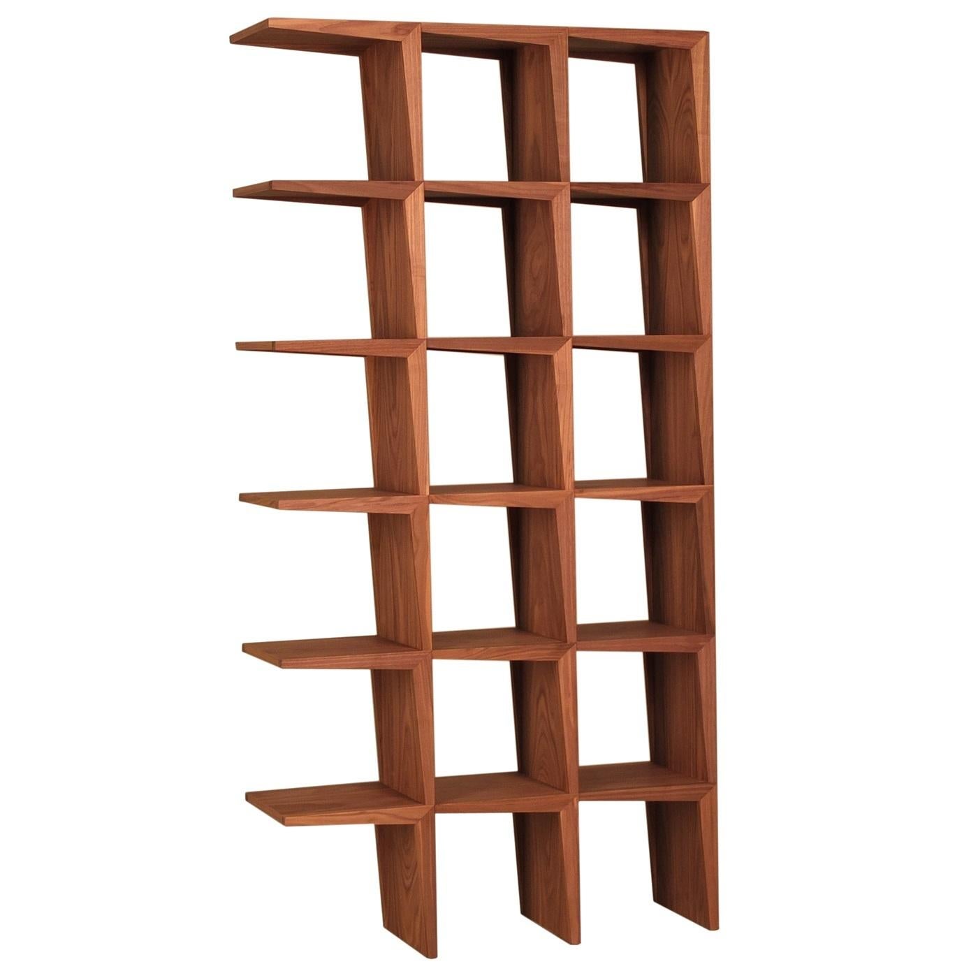 Designed by celebrated Israeli architect Itamar Harari, this walnut bookcase can be used on both sides, making this a sophisticated and modern room divider as well. The unique Silhouette that leaves one side opened, allows for the combination of