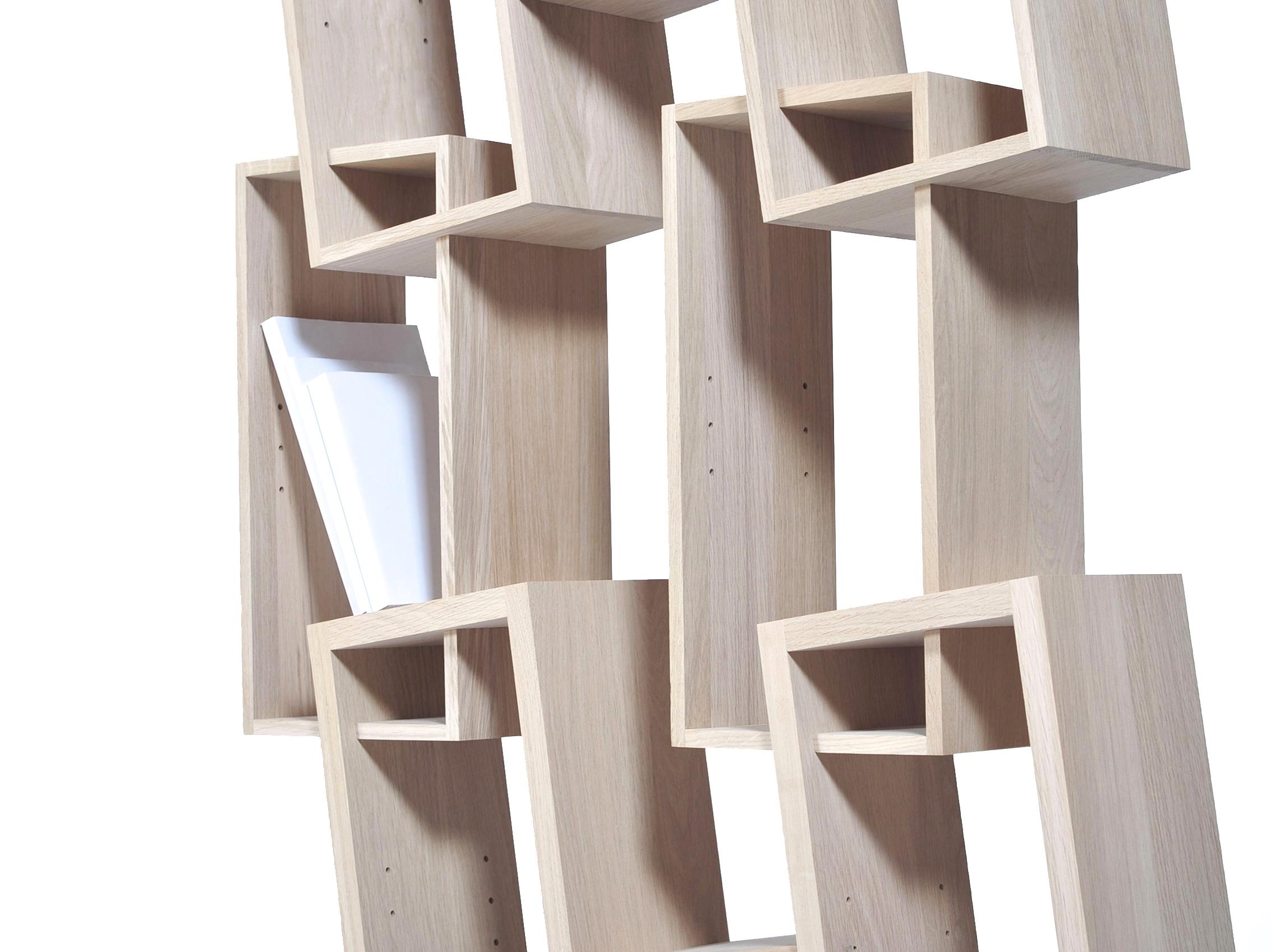 Grafic, sculptural, the Kao Triple bookcase brings to light books and artefacts. An adjustable glass shelf can be added in each unit.

100% solid oak from sustainable French forests. Delivered assembled and with 18 glass tablets. Designed and made