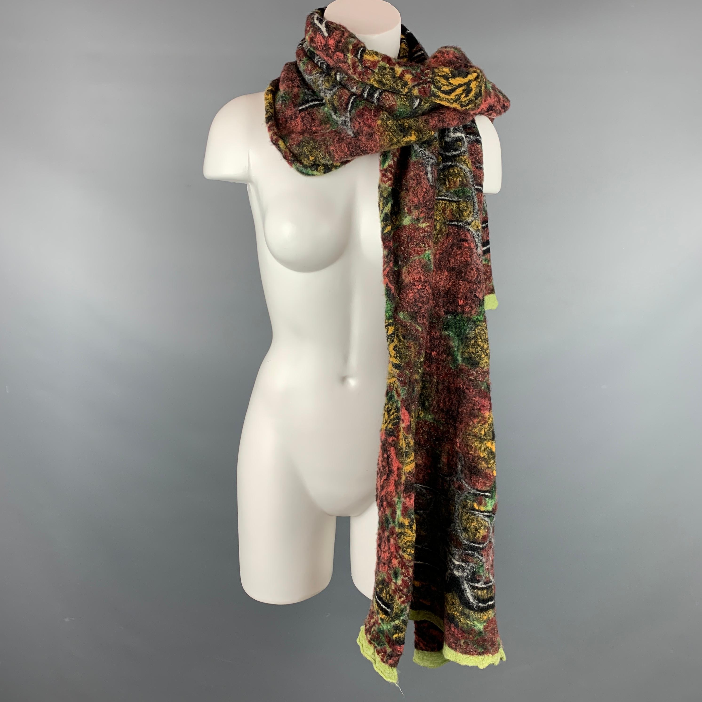 KAPITAL scarf comes in a multi-color woven material. Made in Japan.

Very Good Pre-Owned Condition.

Measurements:

22 in. x 80 in. 