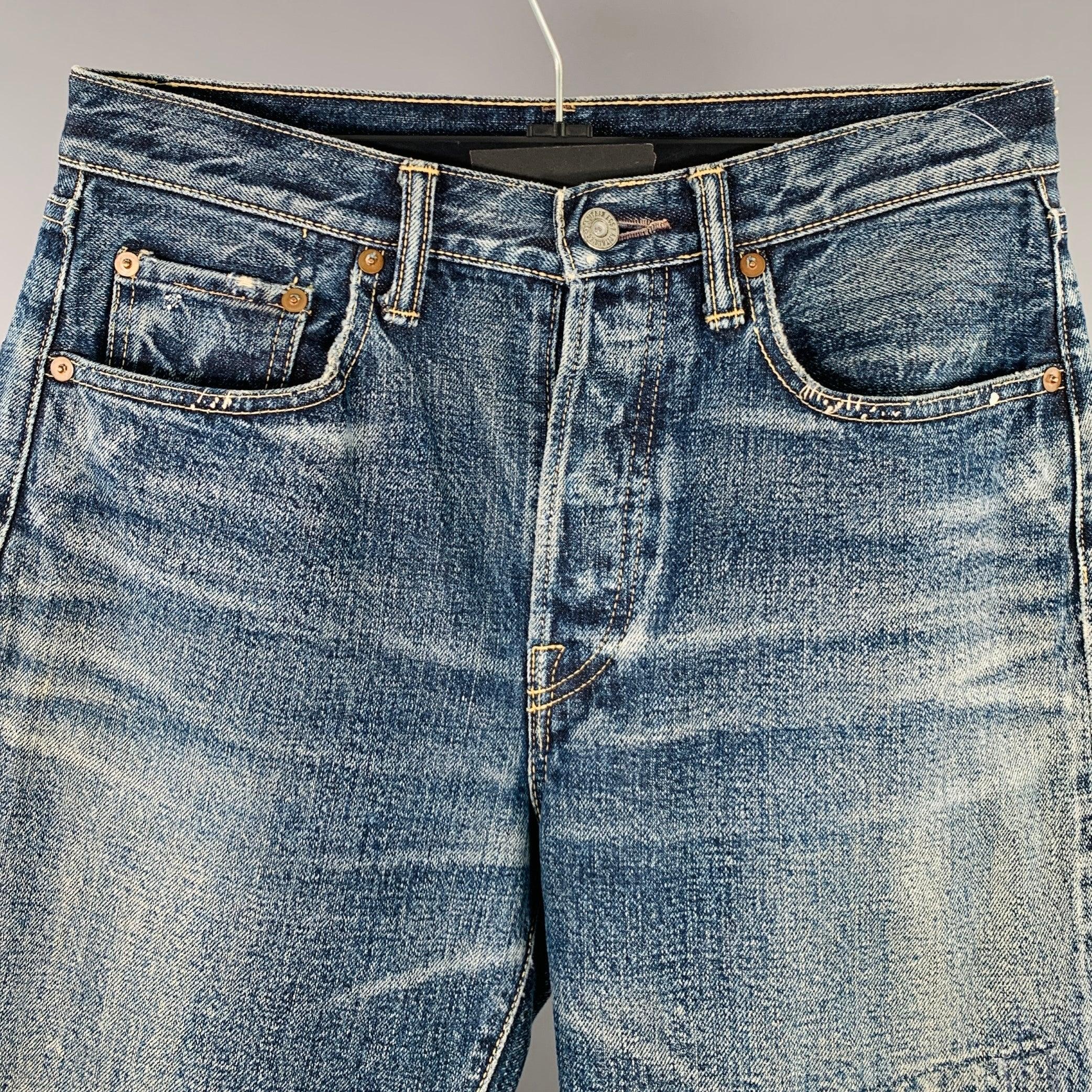 KAPITAL jeans
in a blue cotton woven denim featuring a distressed style, straight leg, and button fly closure. Made in Japan.Excellent Pre-Owned Condition. 

Marked:   size not marked. 

Measurements: 
  Waist: 29 inches Rise: 8.5 inches Inseam: 31