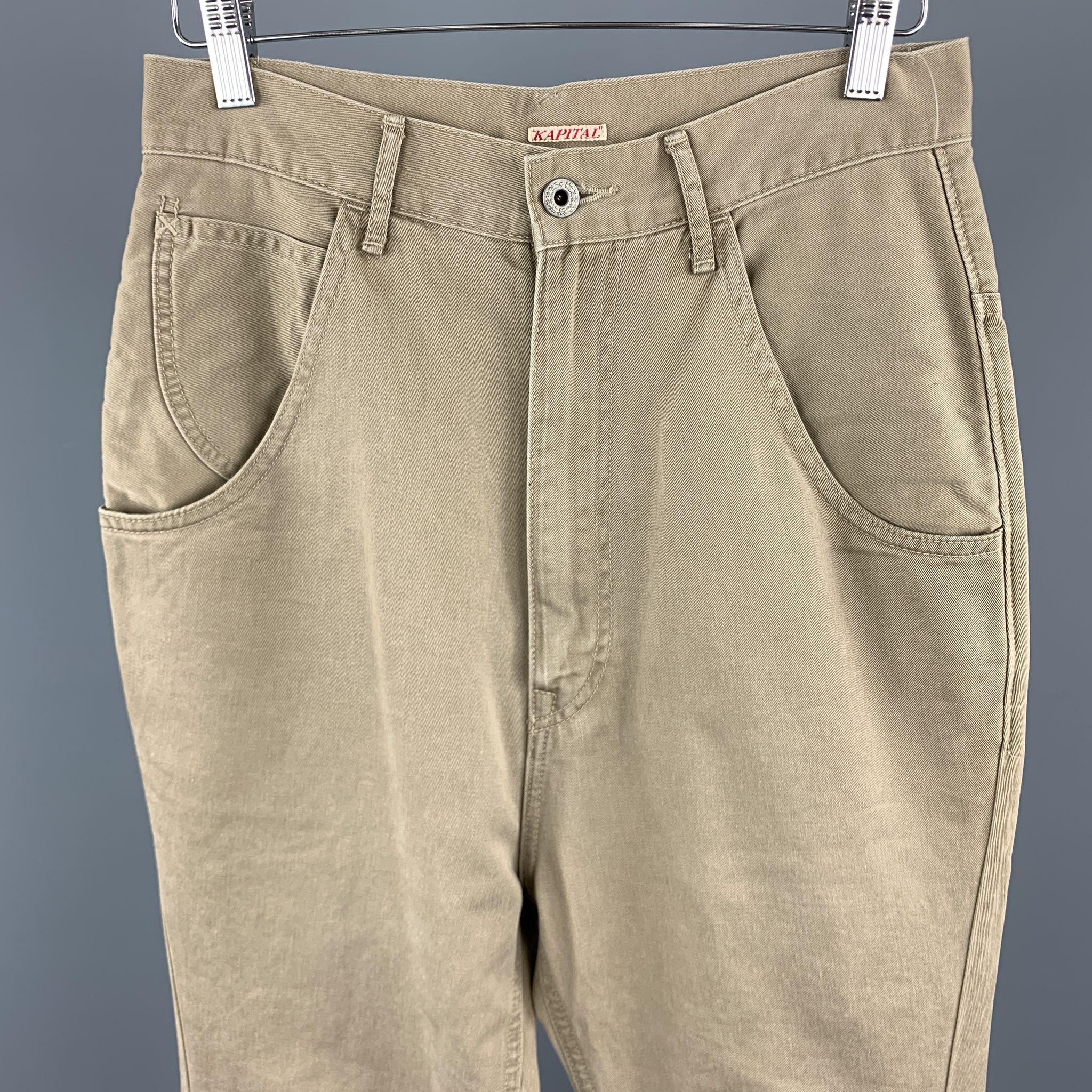 KAPITAL Casual Pants comes in a tan cotton featuring a back belt detail and a button up closure. Made in Japan.

Excellent Pre-Owned Condition.
Marked: (No Size Marked)

Measurements:

Waist: 30 in. 
Rise: 13 in. 
Inseam: 30 in. 

SKU: