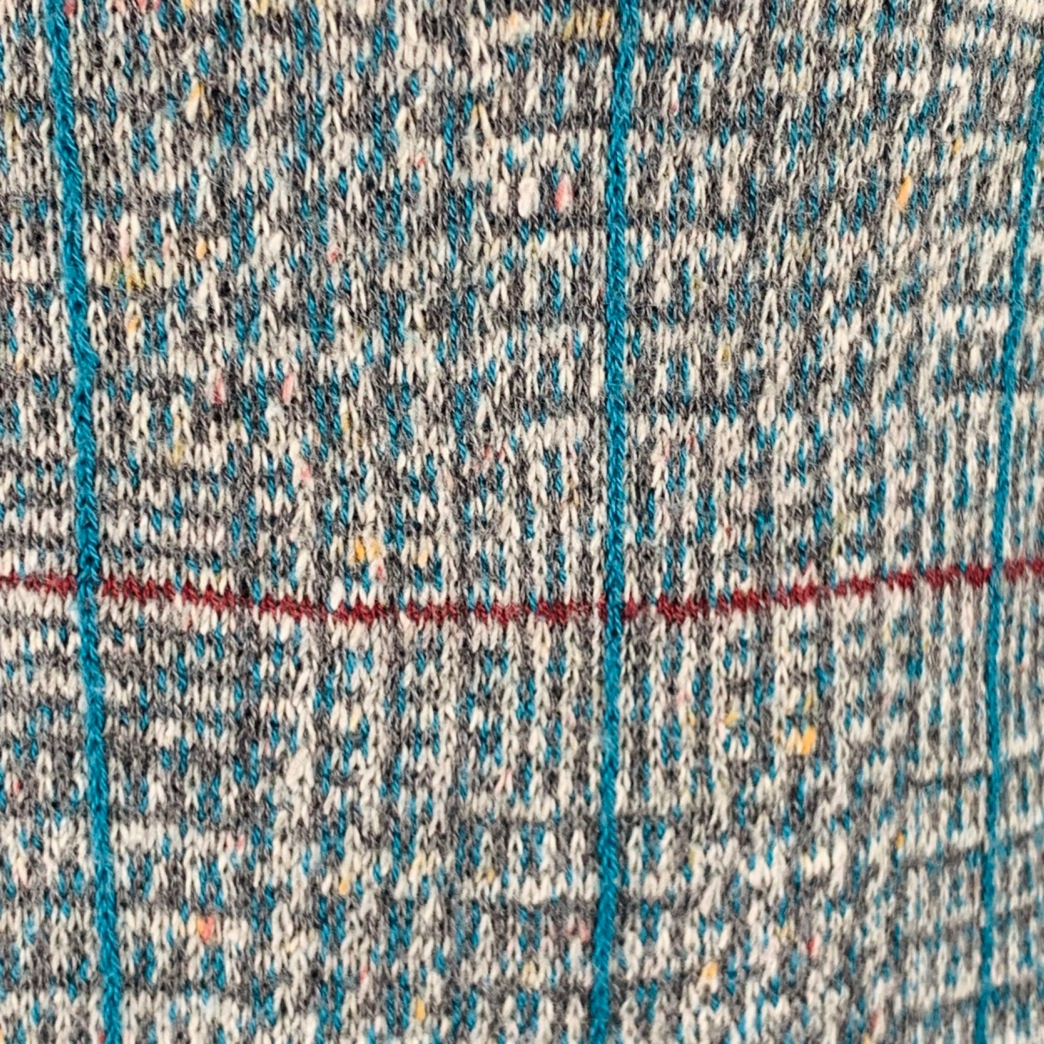 KAPITAL vest
in a grey and blue cotton blend knit featuring a plaid pattern, two pockets, and button closure. Made in Japan.Excellent Pre-Owned Condition. 

Marked:   JP 1 

Measurements: 
 
Shoulder: 12.5 inches Chest: 36 inches Length: 24 inches 
