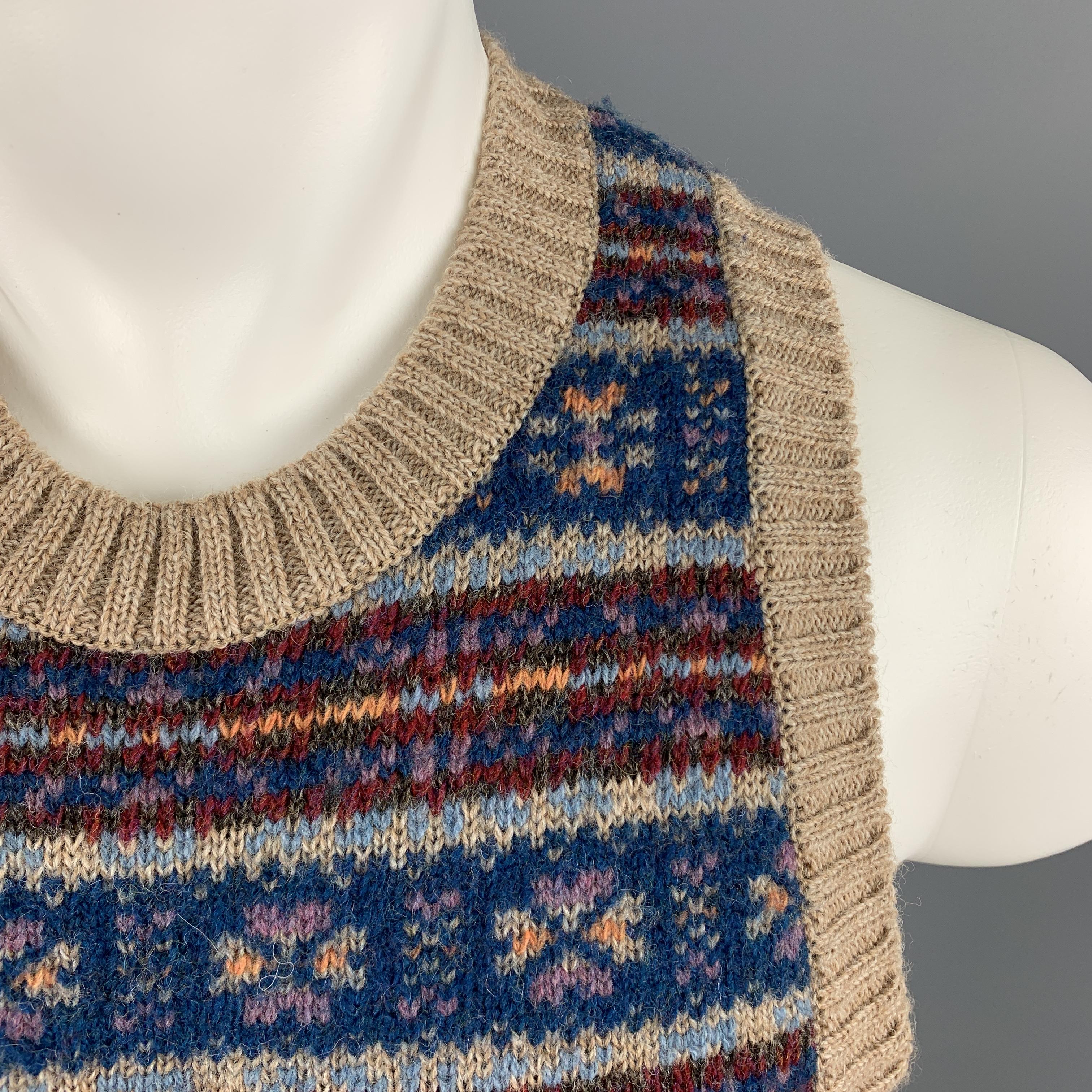 KAPITAL Sweater Vest comes in a multi-color fairisle wool featuring a ribbed crew-neck and front patch pockets. Made in Japan. 

New With Tags.
Marked: 1

Measurements:

Shoulder: 13 in. 
Chest: 31 in. 
Length: 18 in. 