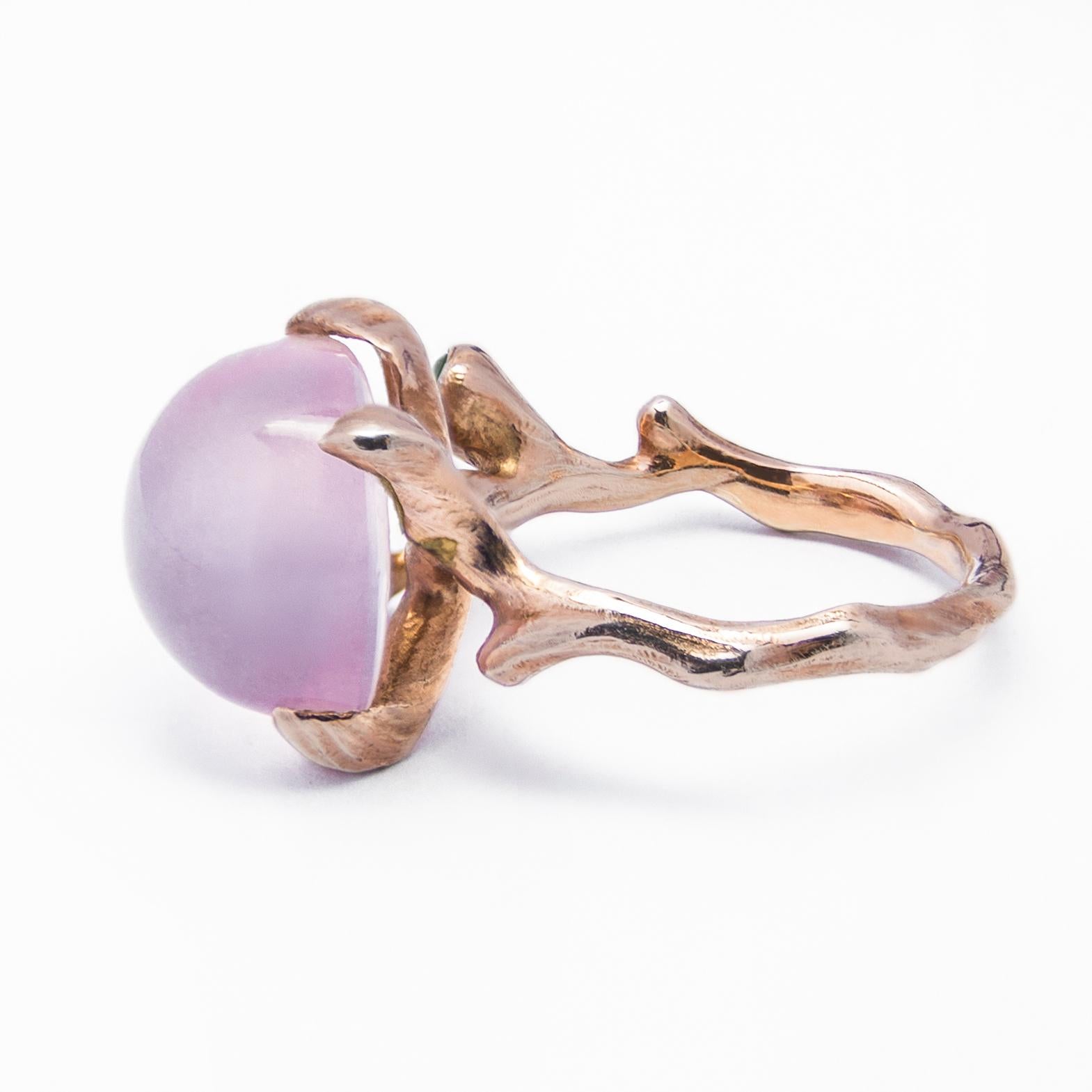 This 18K Rose Gold ring from the Kara collection is crafted at the TVRRINI studio and features a 10.1-carat square Rose Quartz cabochon and round-faceted Emerald. The design is inspired by fruit growing on a tree. Rose Quartz is cut and mounted with