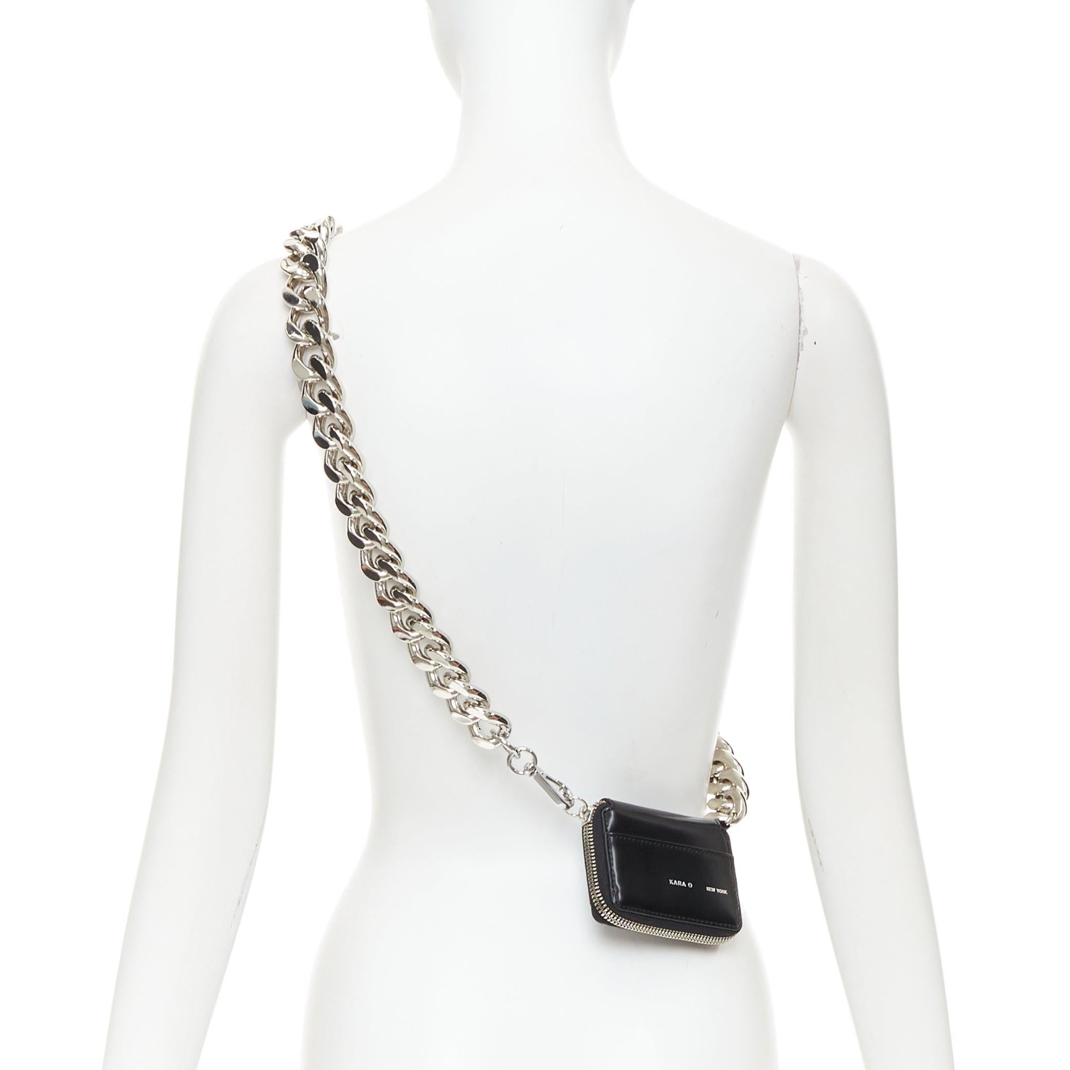 KARA Bike Chain Wallet black leather silver chunky chain micro crossbody bag
Reference: ECLO/A00164
Brand: Kara
Model: Bike Chain Wallet
Collection: SS2019
Material: Leather, Metal
Color: Black, Silver
Pattern: Solid
Closure: Zip
Lining: Black