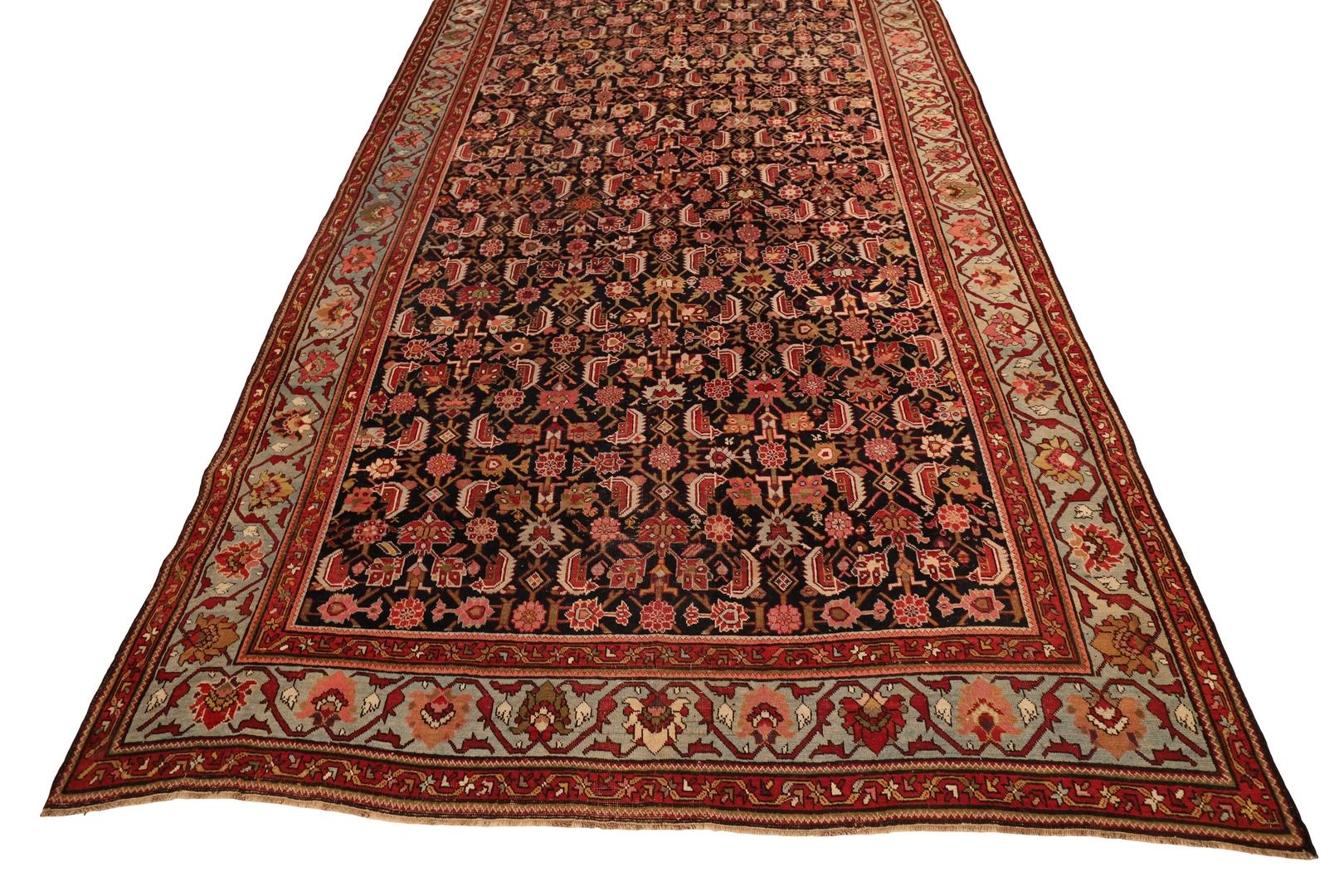 This exquisite Karabagh Caucasian rug is truly a masterpiece of the craft. Measuring an impressive 7'11