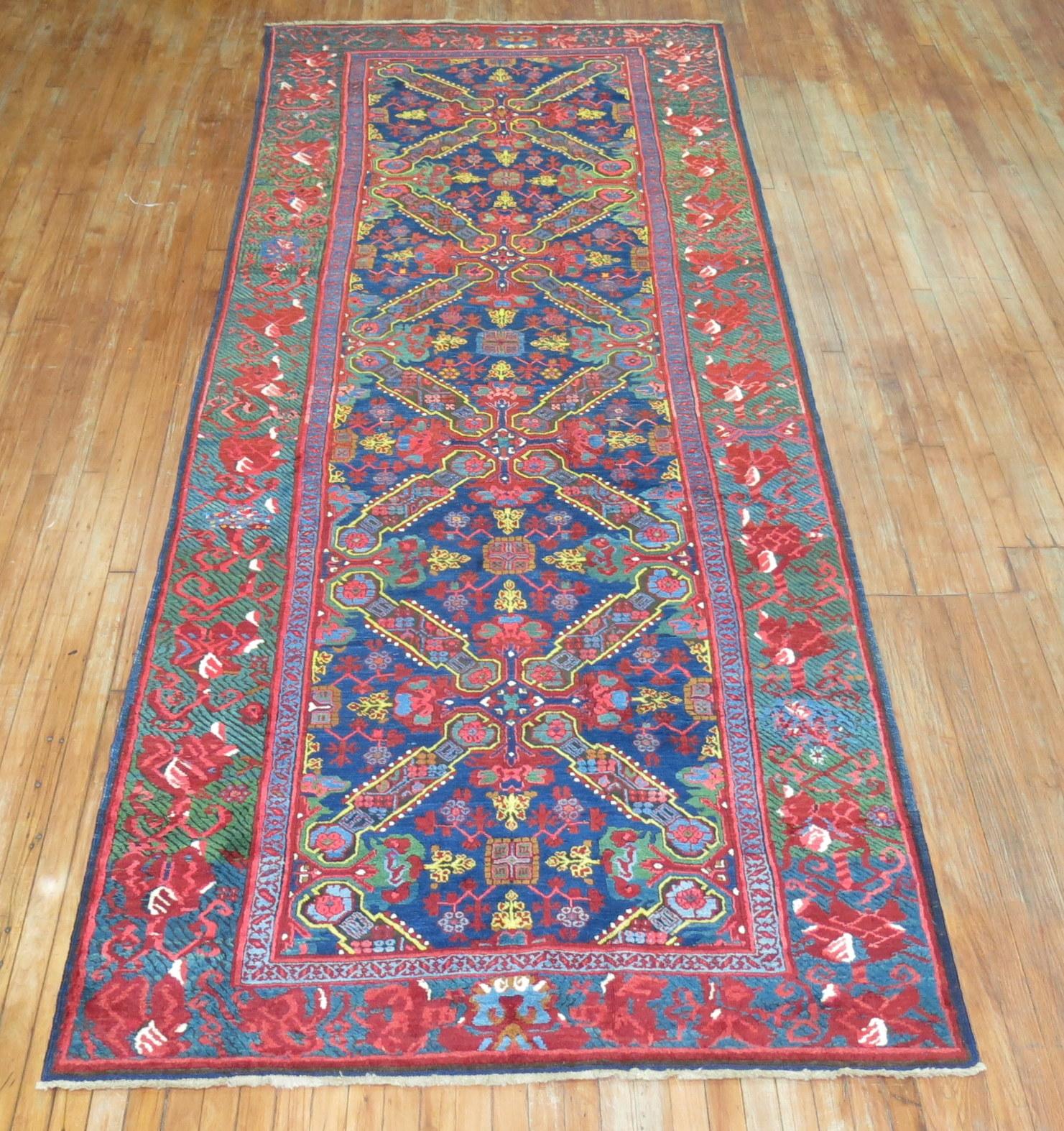 A spirited gallery size Karabagh rug with a zeychour keyhole design. Lustrous wool and jewel toned colors.
