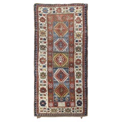 Tapis Kazak antique en laine rouge et bleue Karachopf  4'x9'2'' circa 1870-1900