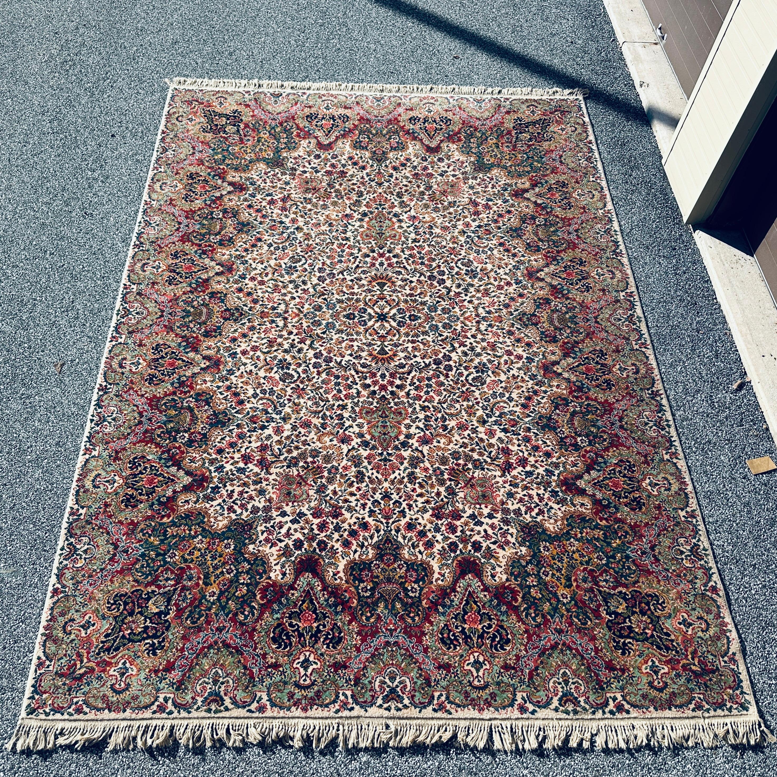 A beautiful large Karastan Floral Kirman 700/742 Rug. Labeled size  8'8