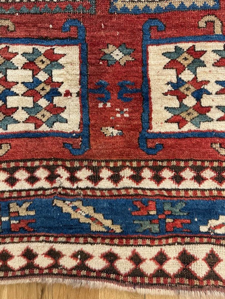 Karatchoph Kazak rug from Armenia,southwest Caucasus

Age: circa 1860

Size: 6′.5″x5′.3″ (196×160 cm)

The warm abrashed red ground displays the characteristic octagonal ivory medallion centered by a broad nicely abrashed green panel which is