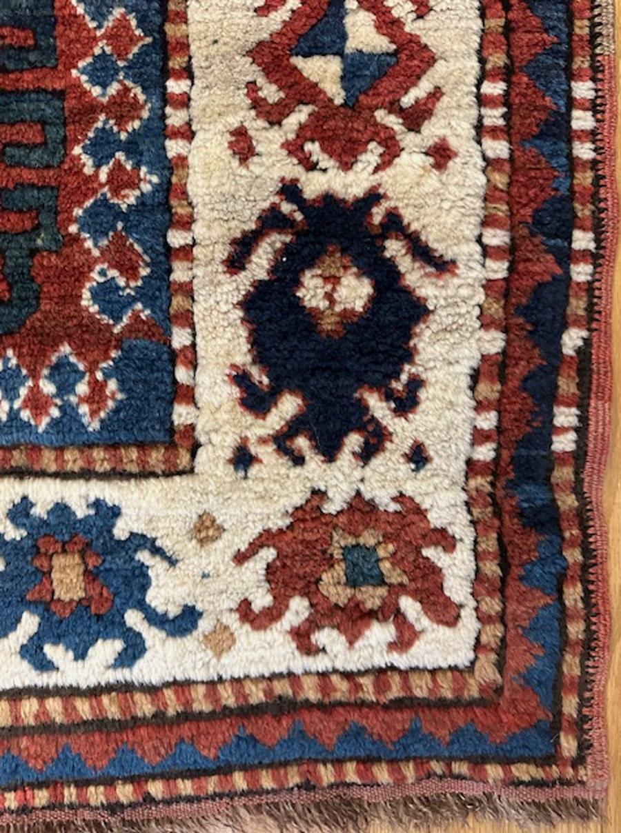 Hand-Woven Karatchoph Kazak rug For Sale