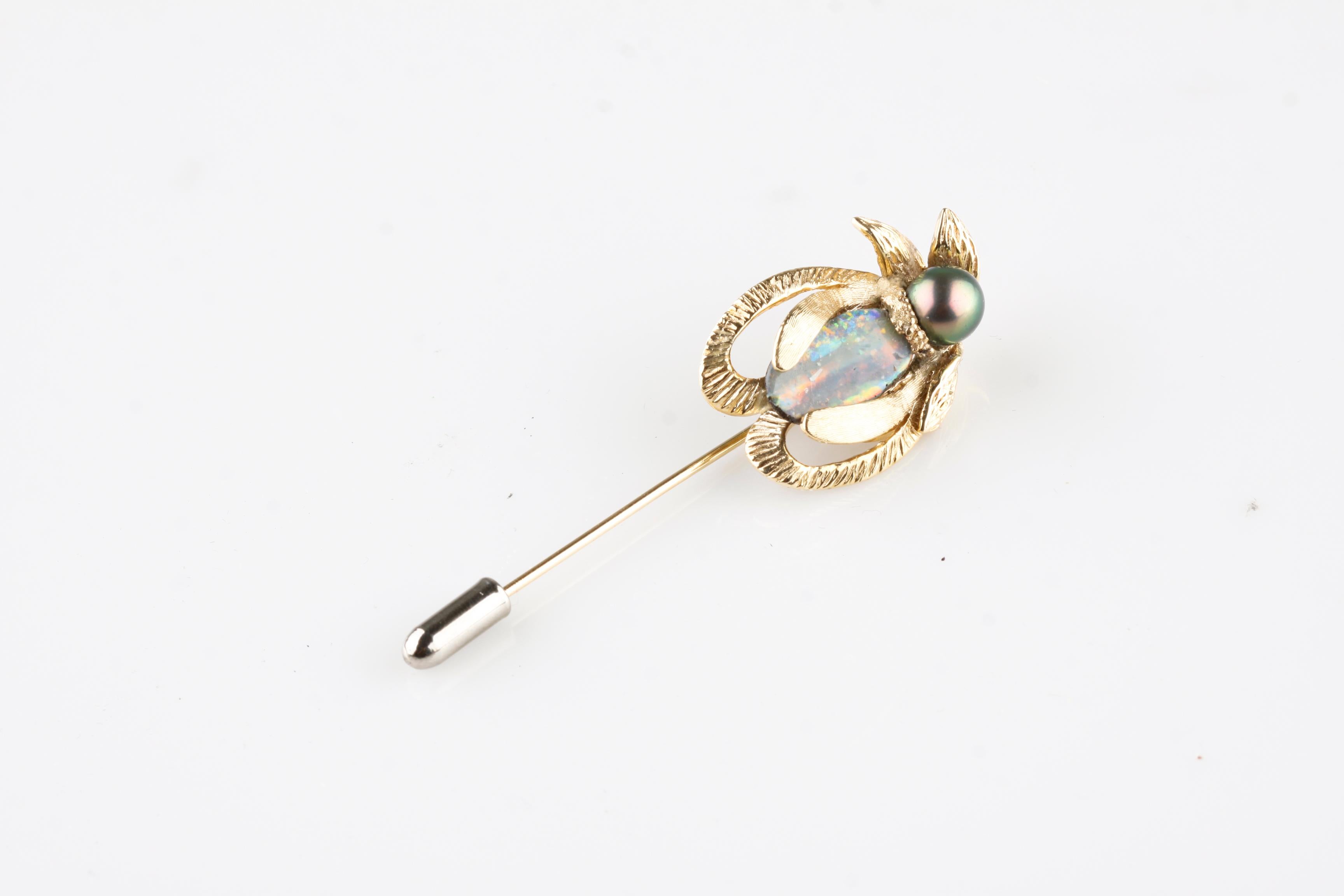 Gorgeous 14k Yellow Gold Pin with Ornate Design and Tahitian Pearl and Opal Cabochon Accents
Total Length of Pin = 67 mm
Length of Beetle = 29 mm
Width of Beetle = 20 mm
Total Mass = 9.6 grams
Approximate Carat Weight of Opal = 4.12 ct
Tahitian