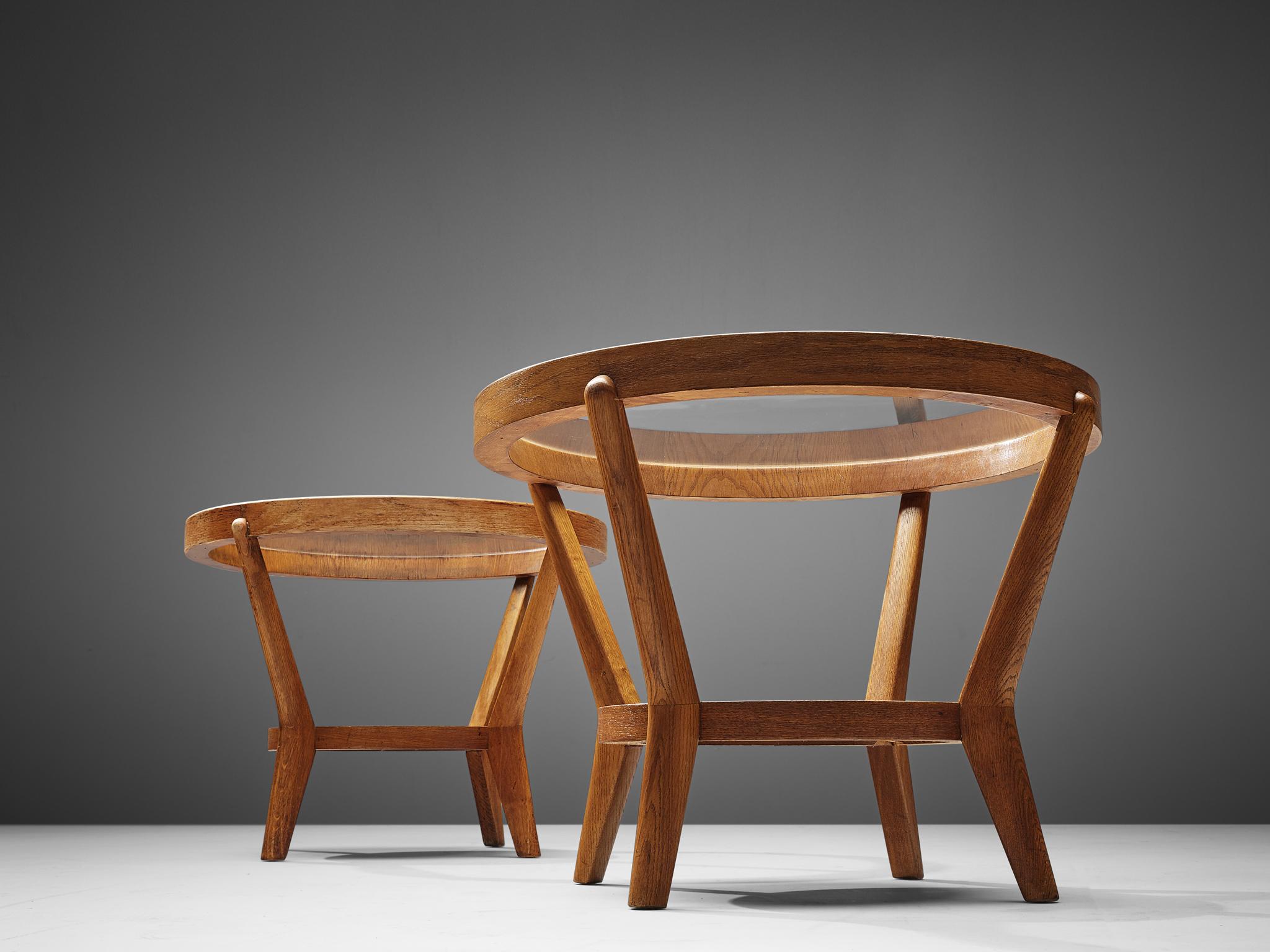 Karel Koželka and Antonín Kropácek for Interier Praha, coffee tables, oak and glass, Czech Republic, 1960s

An iconic Czechoslovak design piece by designers Karel Kozelka and Antonin Kropacek. The table has an oak frame, with a glass top. The