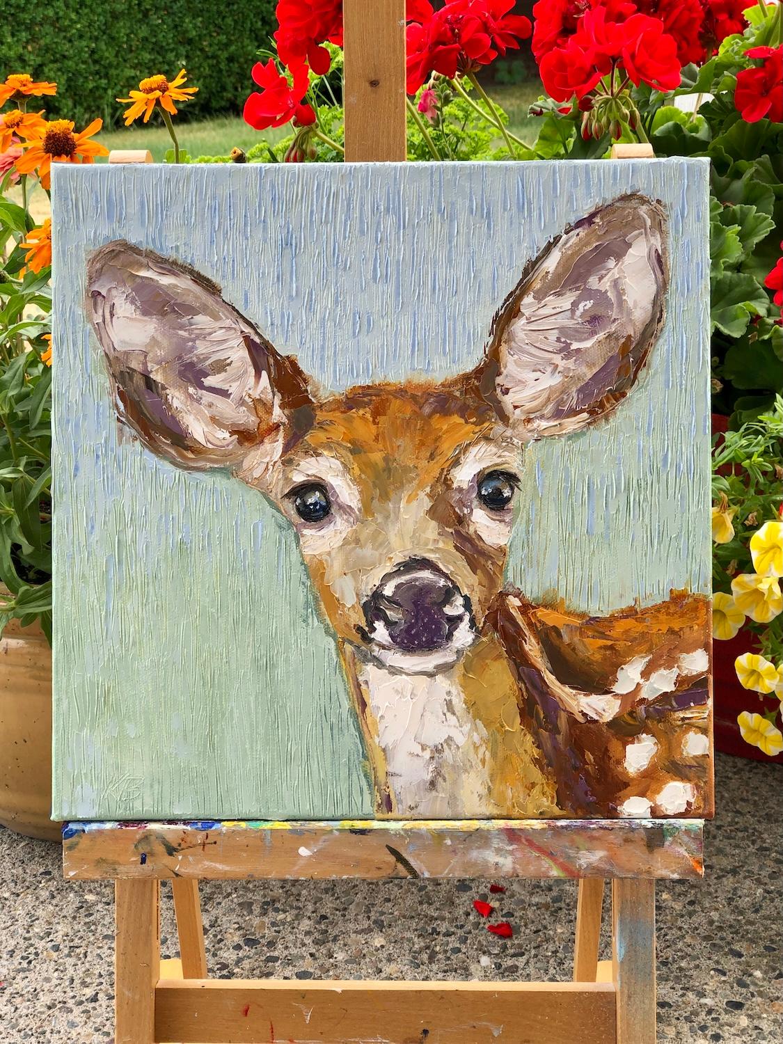 <p>Artist Comments<br>A young fawn stands alert, its big ears and soft eyes full of quiet curiosity. Artist Karen Barton used both palette knife and brush to bring out rich textures across the canvas. The piece captures the fawnâ€™s gentle spirit