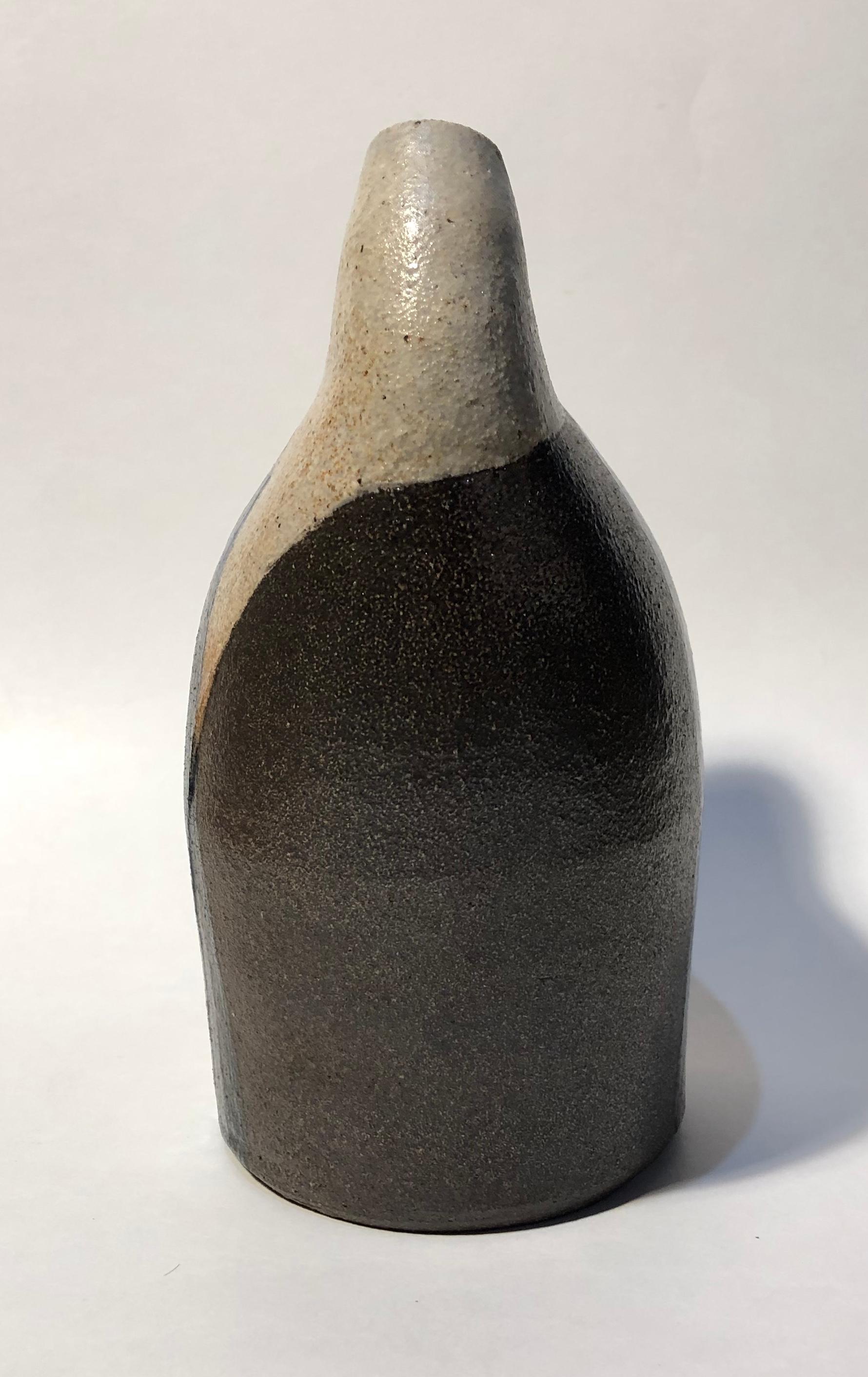 Karen Karnes (1925-2016)
Vase with double neck
Stoneware
Measures: 8 1/4 x 5 1/2 x 4 inches
Stamped 