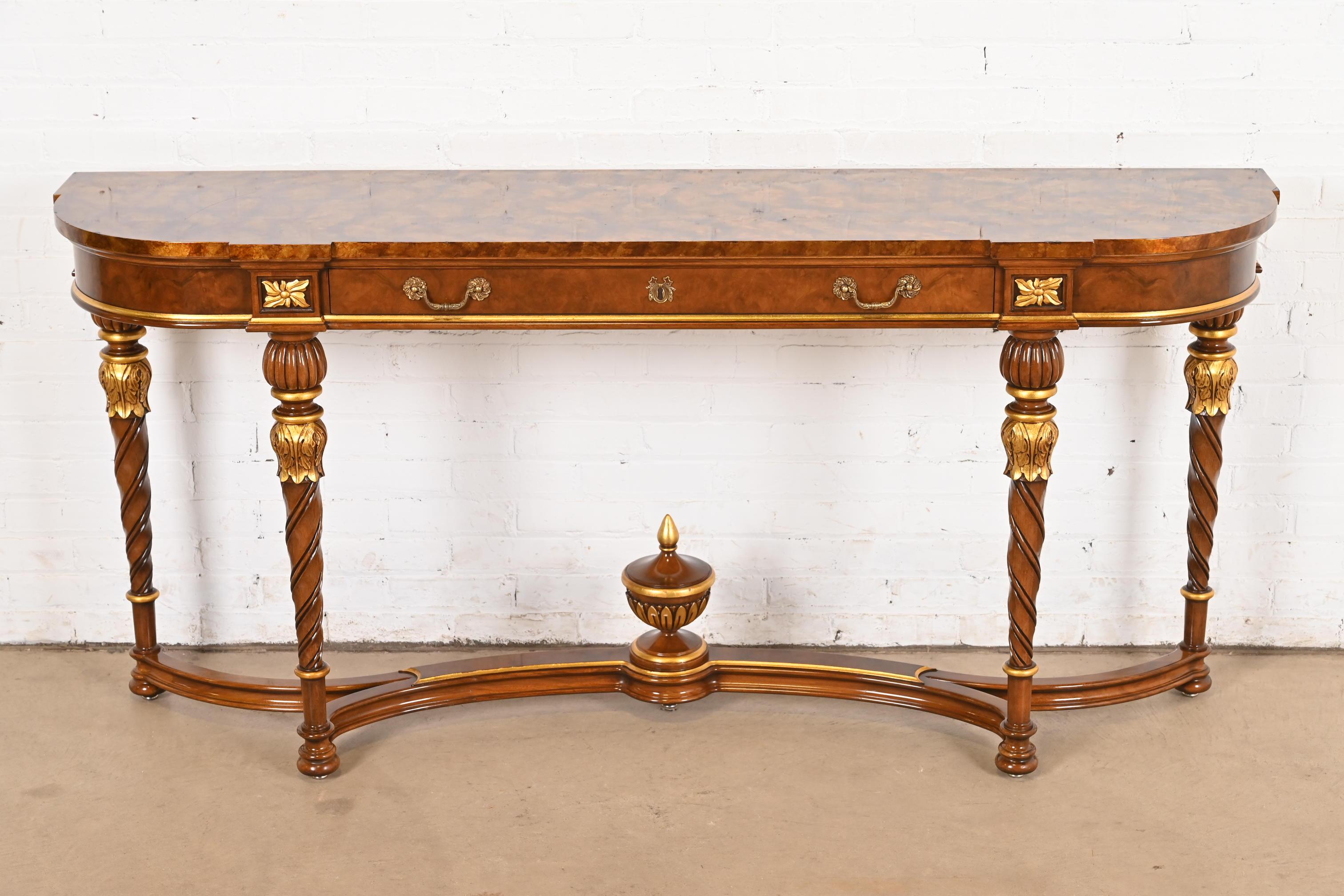 A gorgeous French Regency Louis XVI style console table, entry table, or buffet server

By Karges Furniture

USA, Circa 1980s

Beautiful carved burled walnut, with faux tortoise shell top, gold gilt accents, and original brass hardware.

Measures: