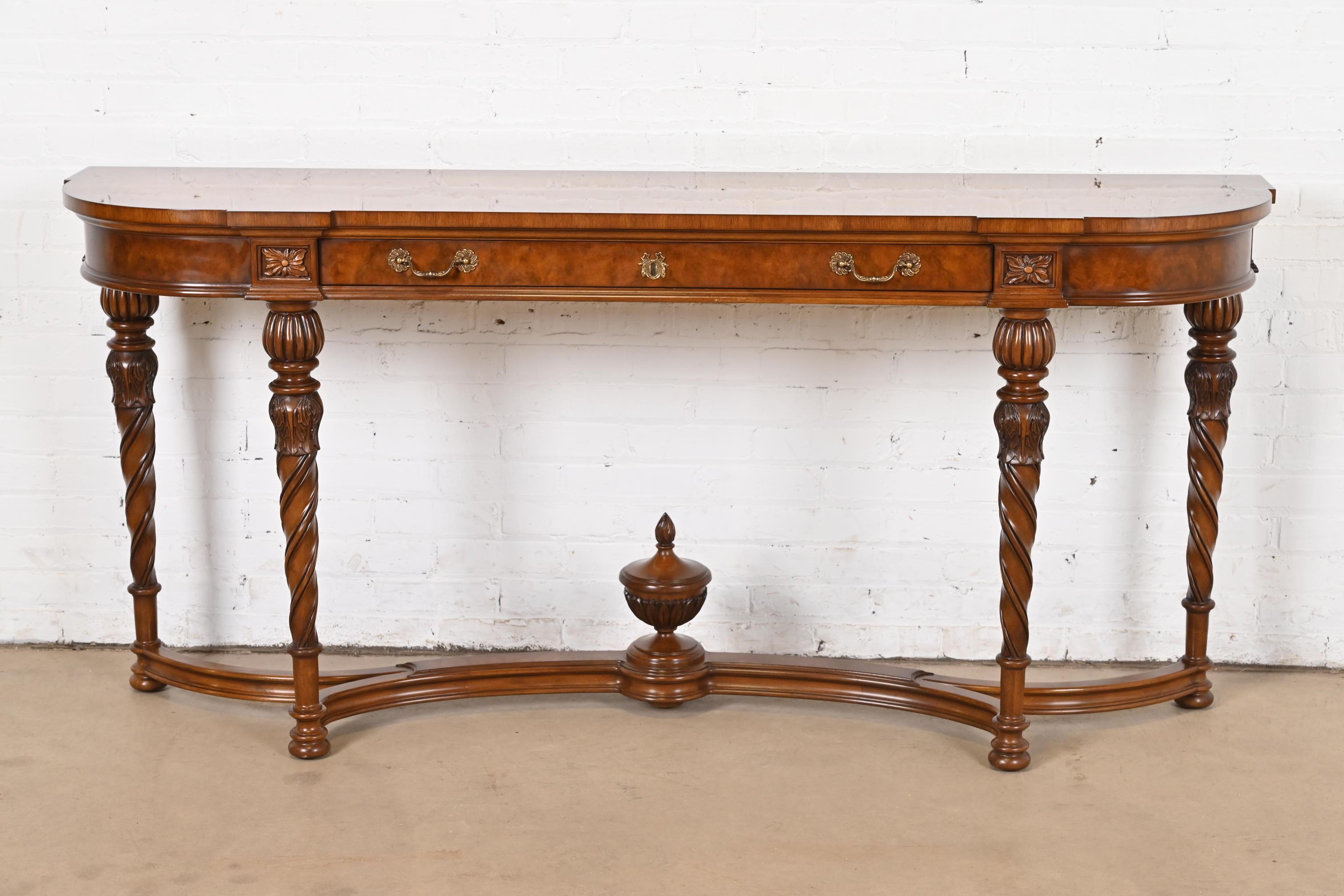 A gorgeous French Regency Louis XVI style console table, entry table, or buffet server

By Karges Furniture

USA, Circa 1980s

Beautiful carved burled walnut, with original brass hardware.

Measures: 72.25