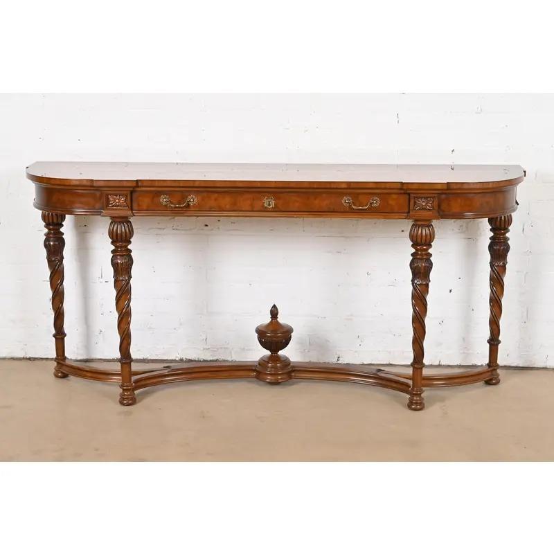 A gorgeous French Regency Louis XVI style console table, entry table, or buffet server

By Karges Furniture

USA, Circa 1980s

Beautiful carved burled walnut, with original brass hardware.

Measures: 72.25