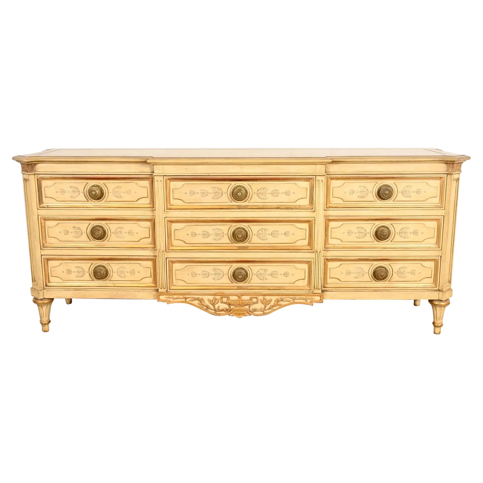 Karges Commode Regency Louis XVI laquée crème et dorée