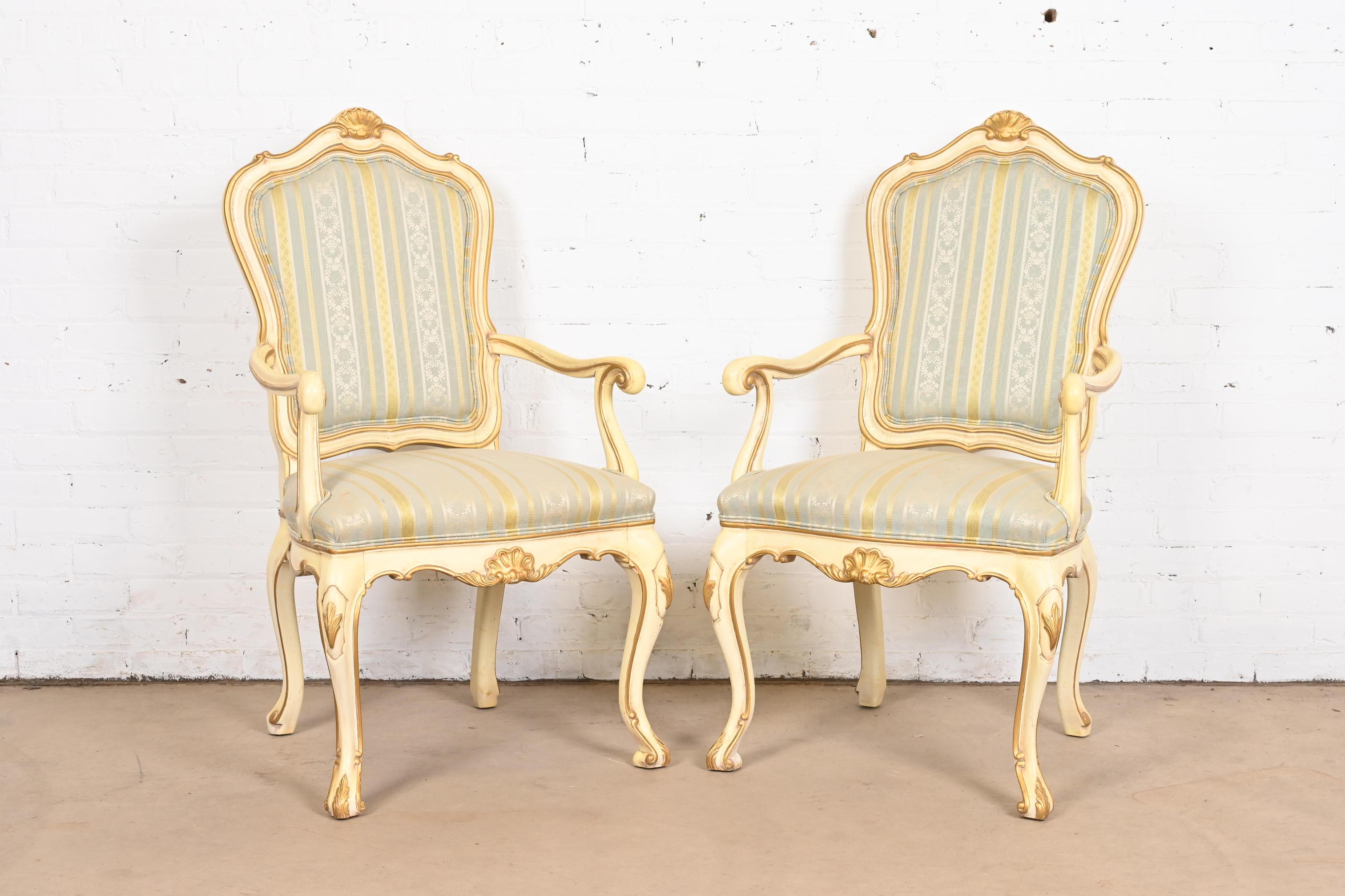 An outstanding pair of French Rococo Louis XV style fauteuils

By Karges Furniture

USA, Circa 1960s

Gorgeous cream lacquered carved solid walnut frames, with gold gilt details, and upholstered seats and backs.

Measures: 23.25