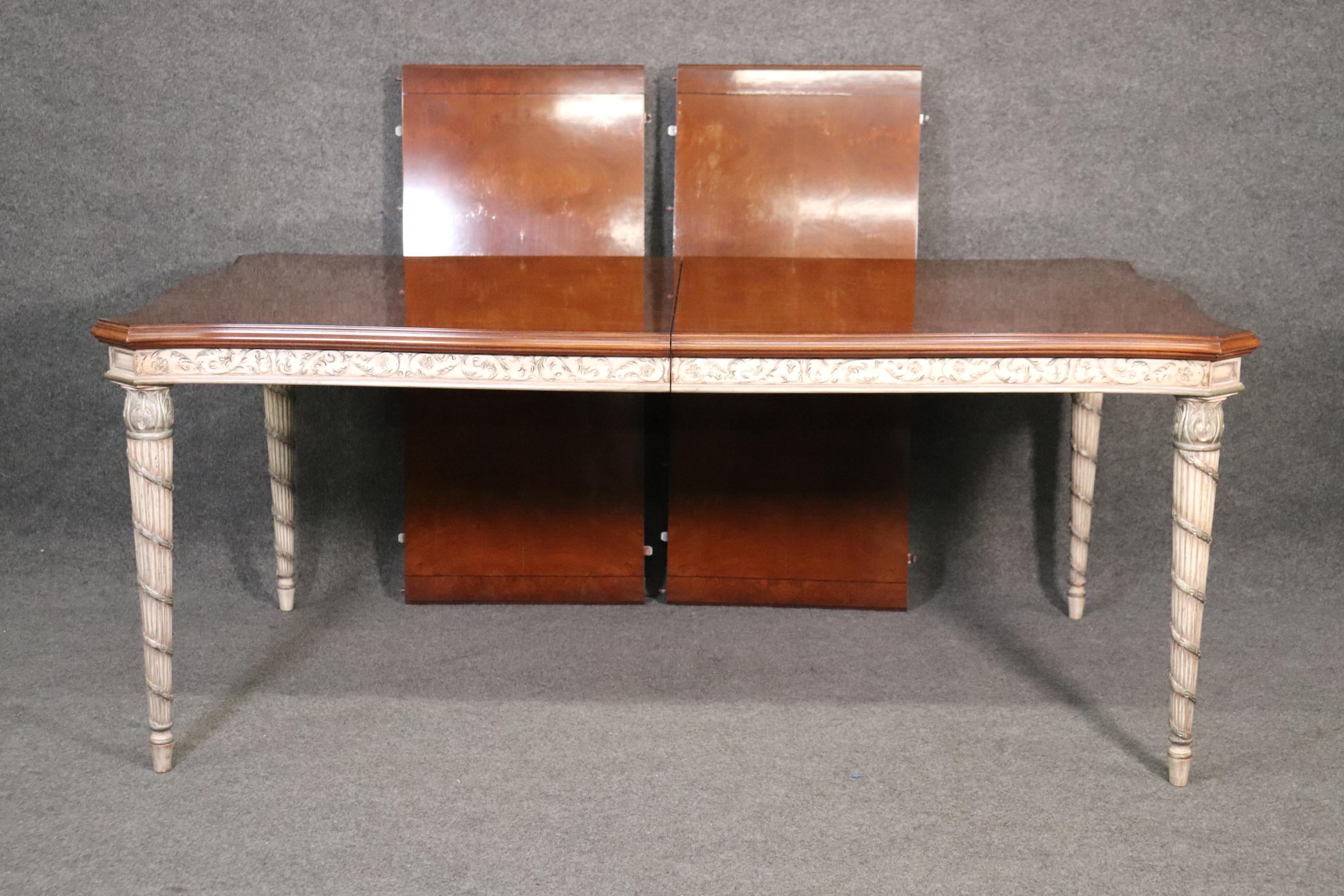 Karges is America's most exclusive manufacturer and always used the best solid woods and hand-carved details and finishes to make the most beautiful French recreations possible. This table is no exception and is in very good condition. The top is