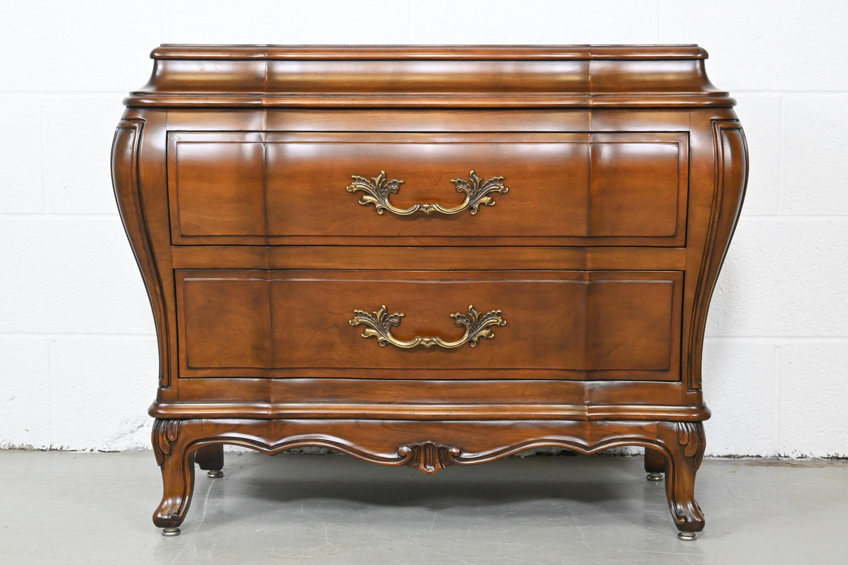 Karges French Provincial Walnut and Burl Nightstand or Bedside Chest

Karges Furniture, USA, 1970s

Measures: 33 Wide x 18 Deep x 26.5 High

Two-drawer burled wood bombay chest with brass pulls.

Professionally Restored. Excellent condition