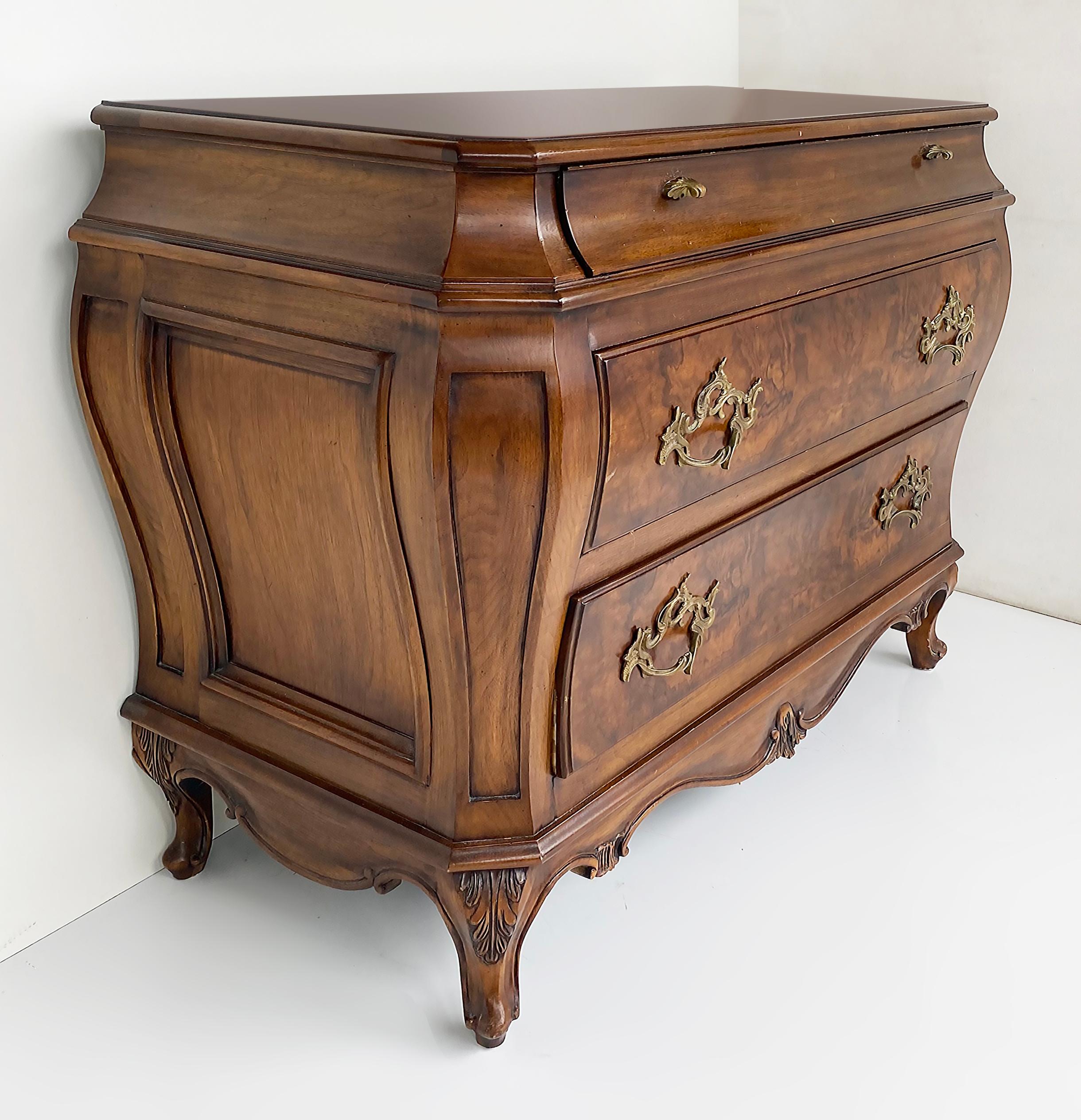 Karges Furniture Louis XVI Bombe 3-Drawer Commode, Burl Walnut

Offered for sale is a late 2oth-century American-made Karges Furniture Company burl and walnut three-drawer chest of drawers commode in the Louis XVI style. The commode has three