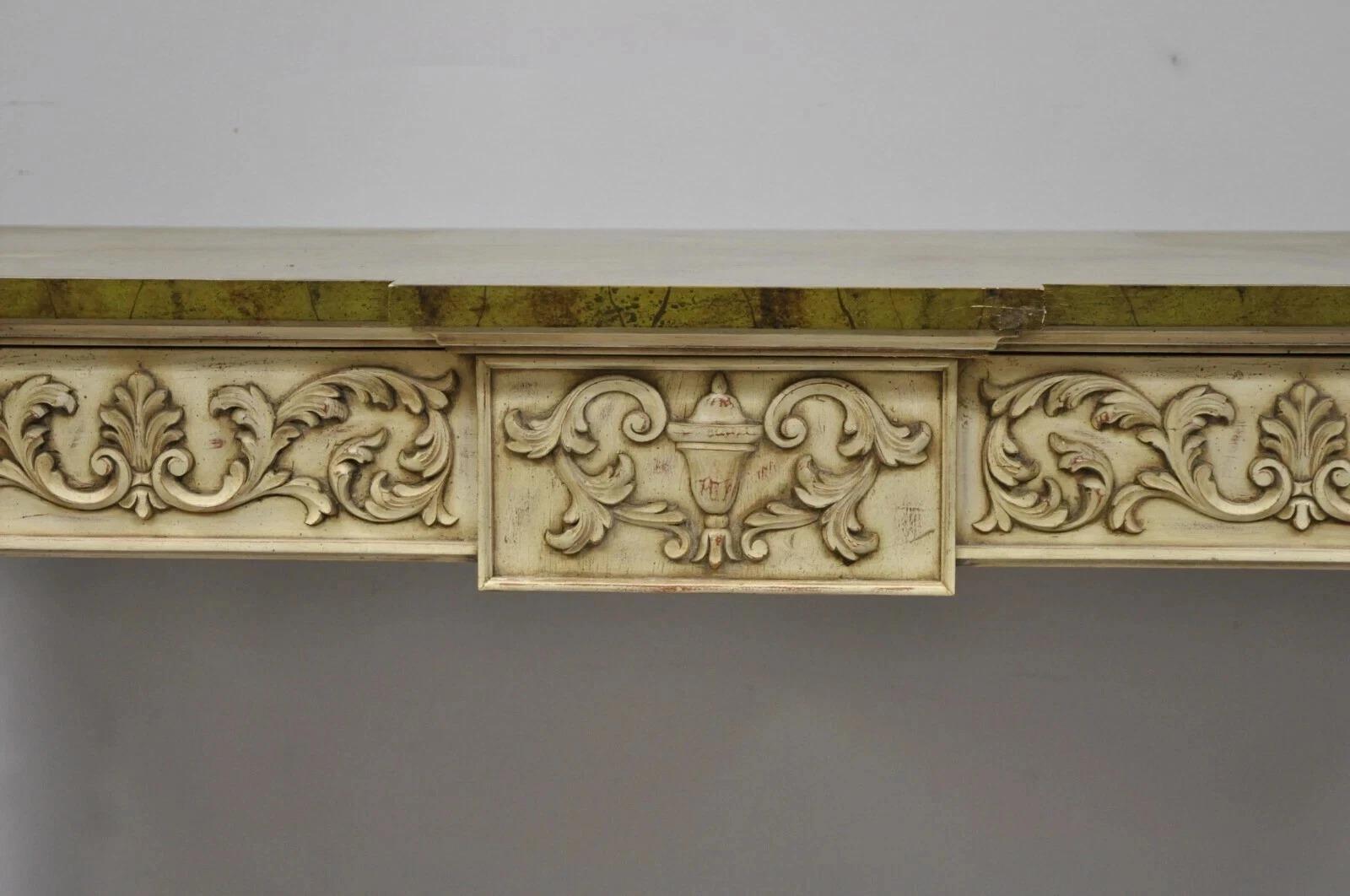 Vintage Karges Italian Neoclassical Swedish Style Carved Console Table with One Drawer. Item features one dovetail constructed drawer, faux marble lacquer finish wooden top, distressed cream finish, original label, tapered legs, quality American