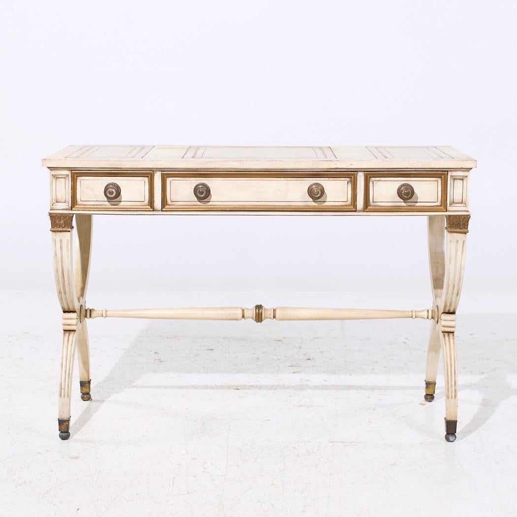 Karges Regency Style X Base Writing Desk

This desk measures: 44.25 wide x 21 deep x 29.75 high, with a chair clearance of 24 inches

We take our photos in a controlled lighting studio to show as much detail as possible. We do not Photoshop out