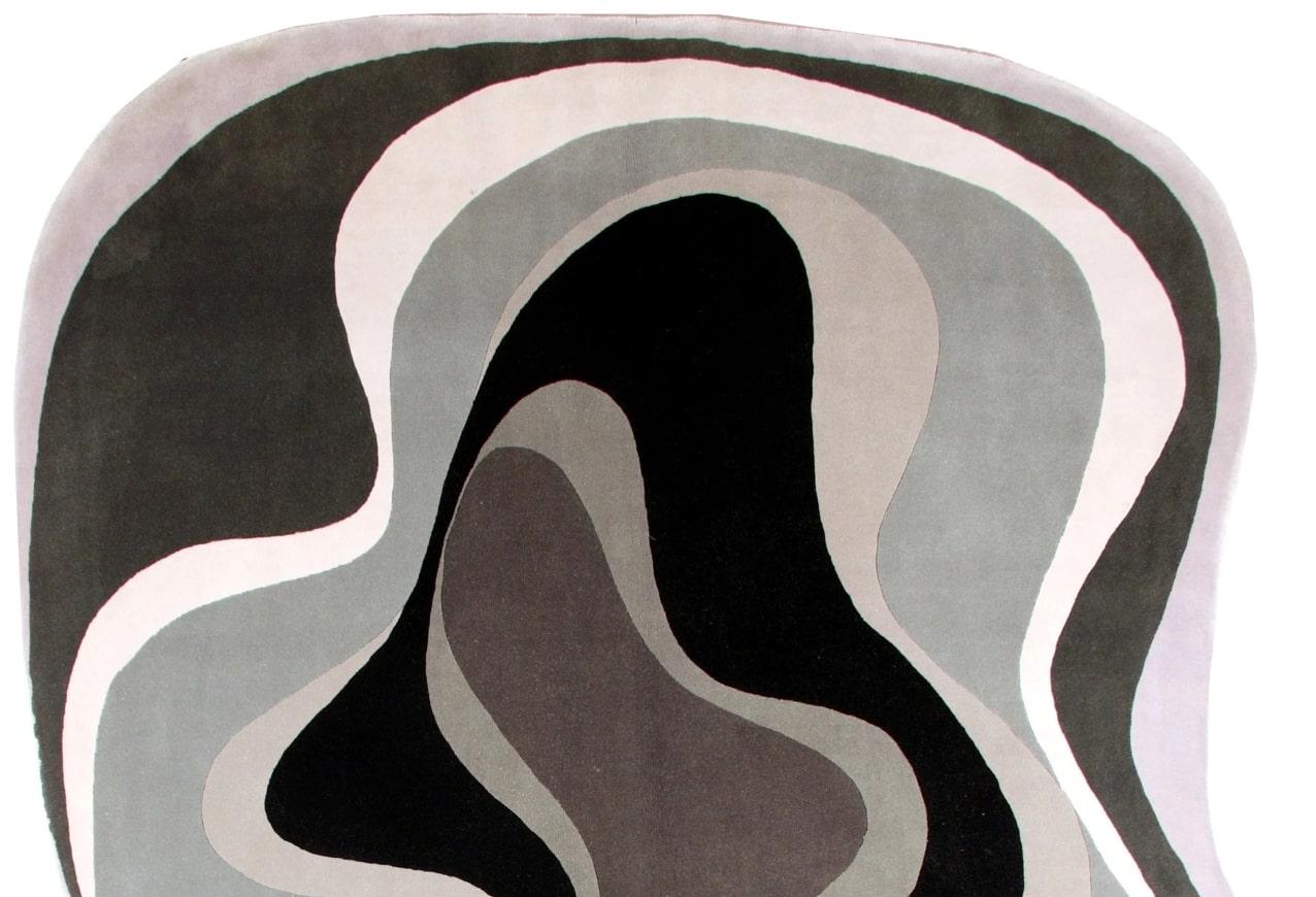 Karim Rashid - 'Abstract 003 Grey' Rug 6' x 9'
Material: 100% Wool

Enhance your home with an extraordinary rug designed by Karim Rashid. One of the most prolific designers of our time, Karim Rashid has won numerous awards for his innovative