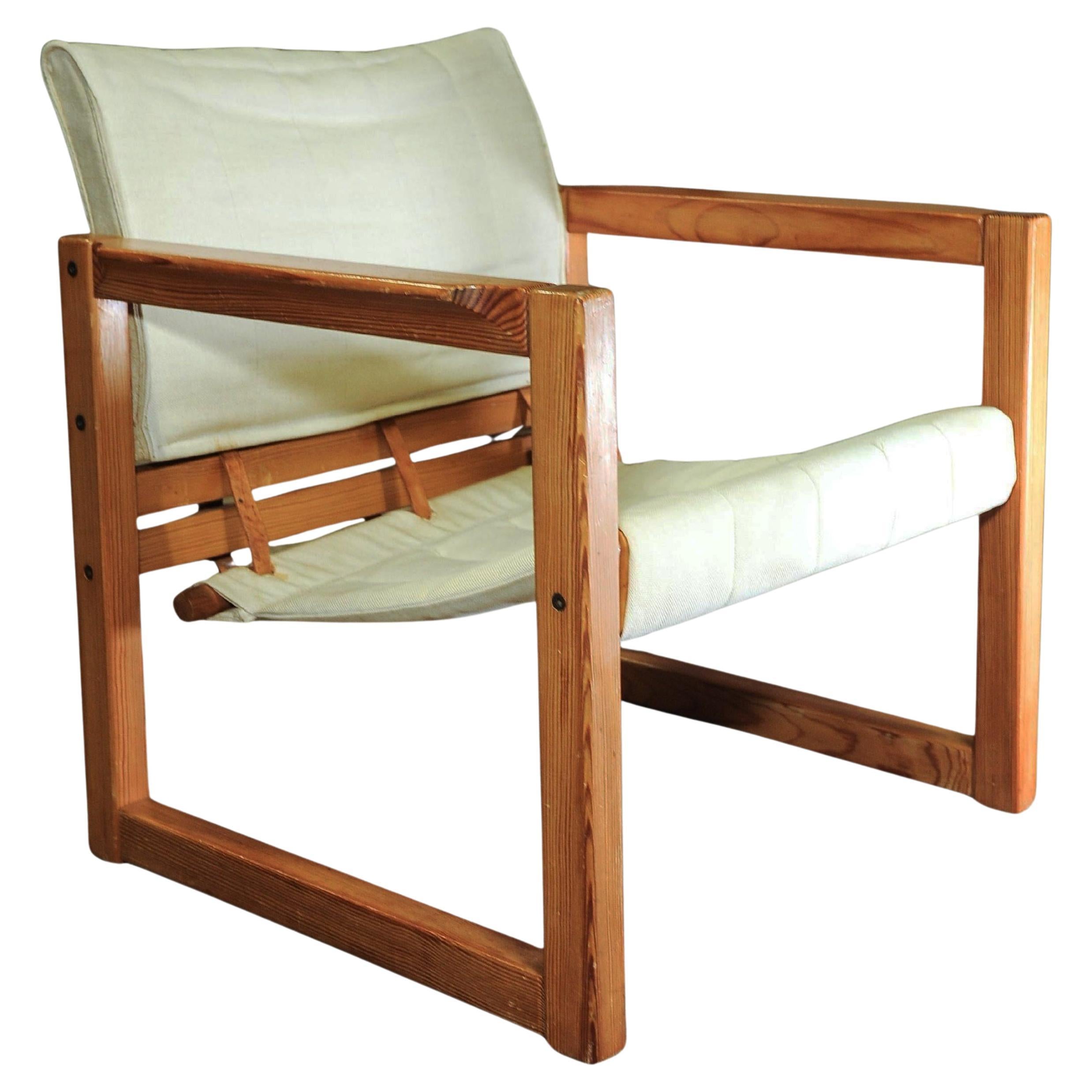 Karin Mobring fauteuil Safari emblématique en pin avec assise en toile et sangles en cuir