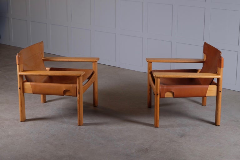 Great pair of armchairs by Karin Mobring, 1970s. Leather and pine wood. 
Slight color differences.
  