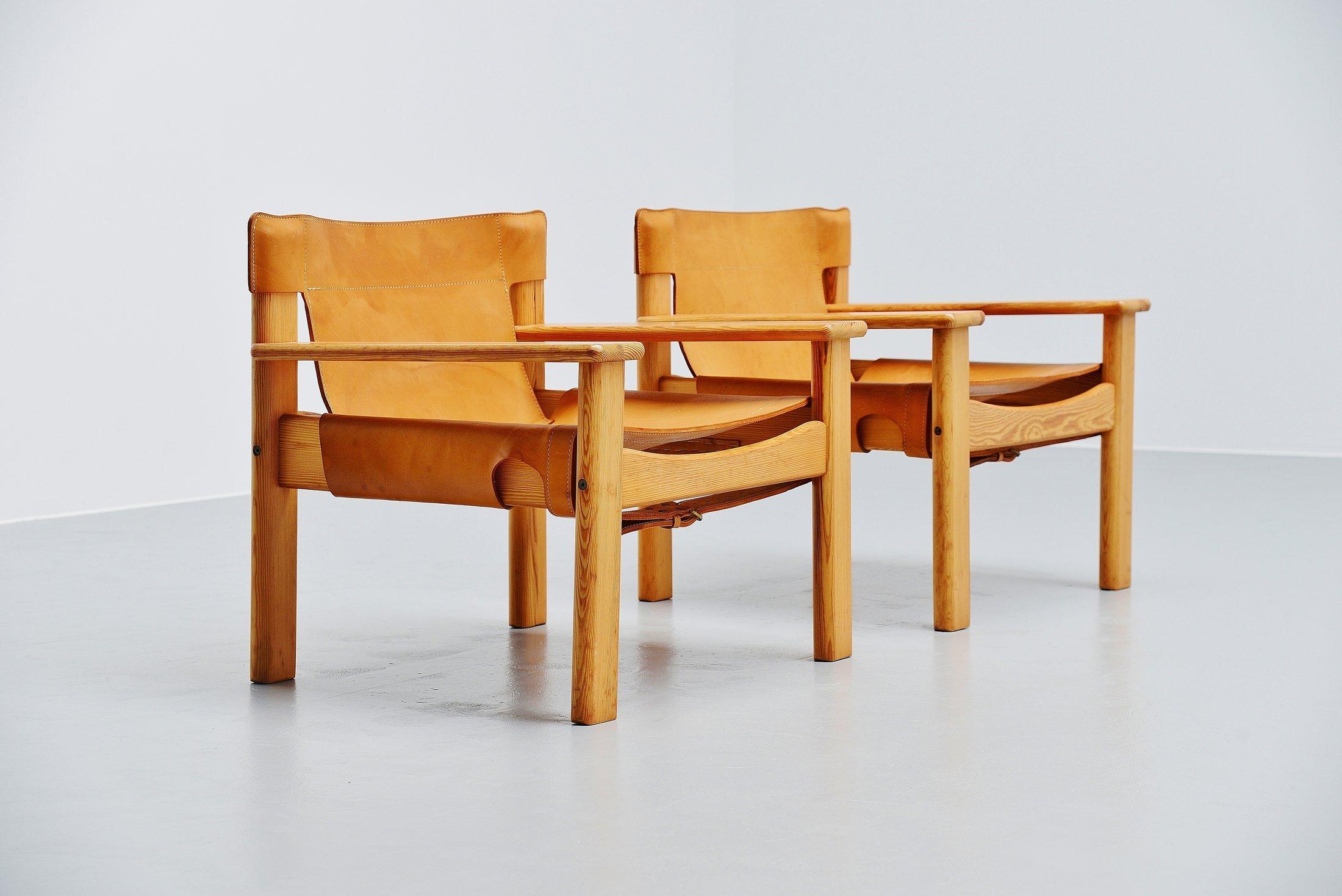 Very nice 'Natura' lounge chairs designed by Karin Mobring and manufactured by Ikea, Sweden, 1977. The chairs have solid pine frames and very nice thick natural leather seats connected to the frames with leather straps. The chairs are in good