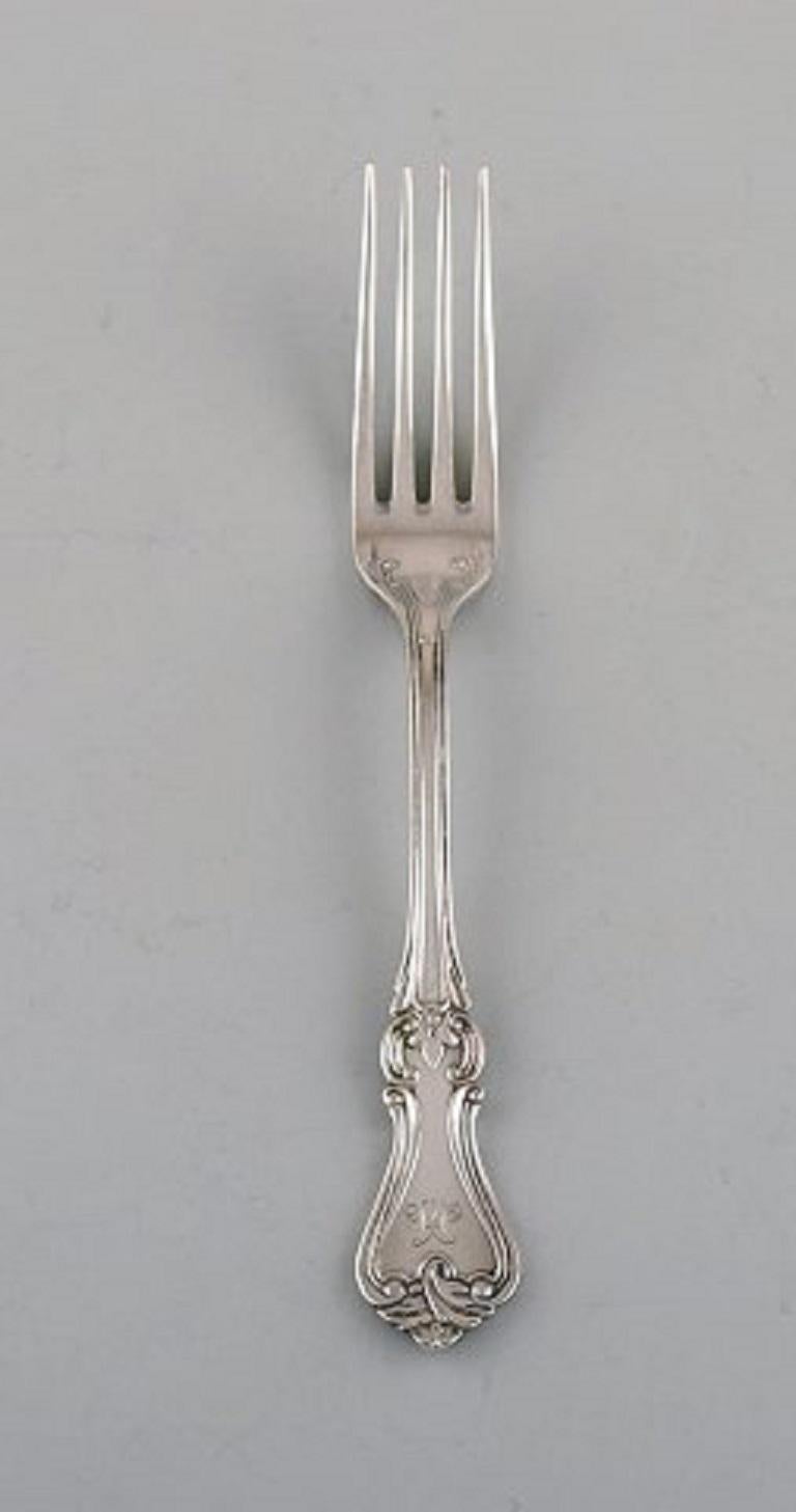 Karl Almgren, Sweden. Four lunch forks in silver 830. Dated 1931.
Measures: 15.3 cm.
Stamped.
In very good condition. With monogram.