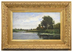 Paesaggio francese di Barbizon di una riva del fiume