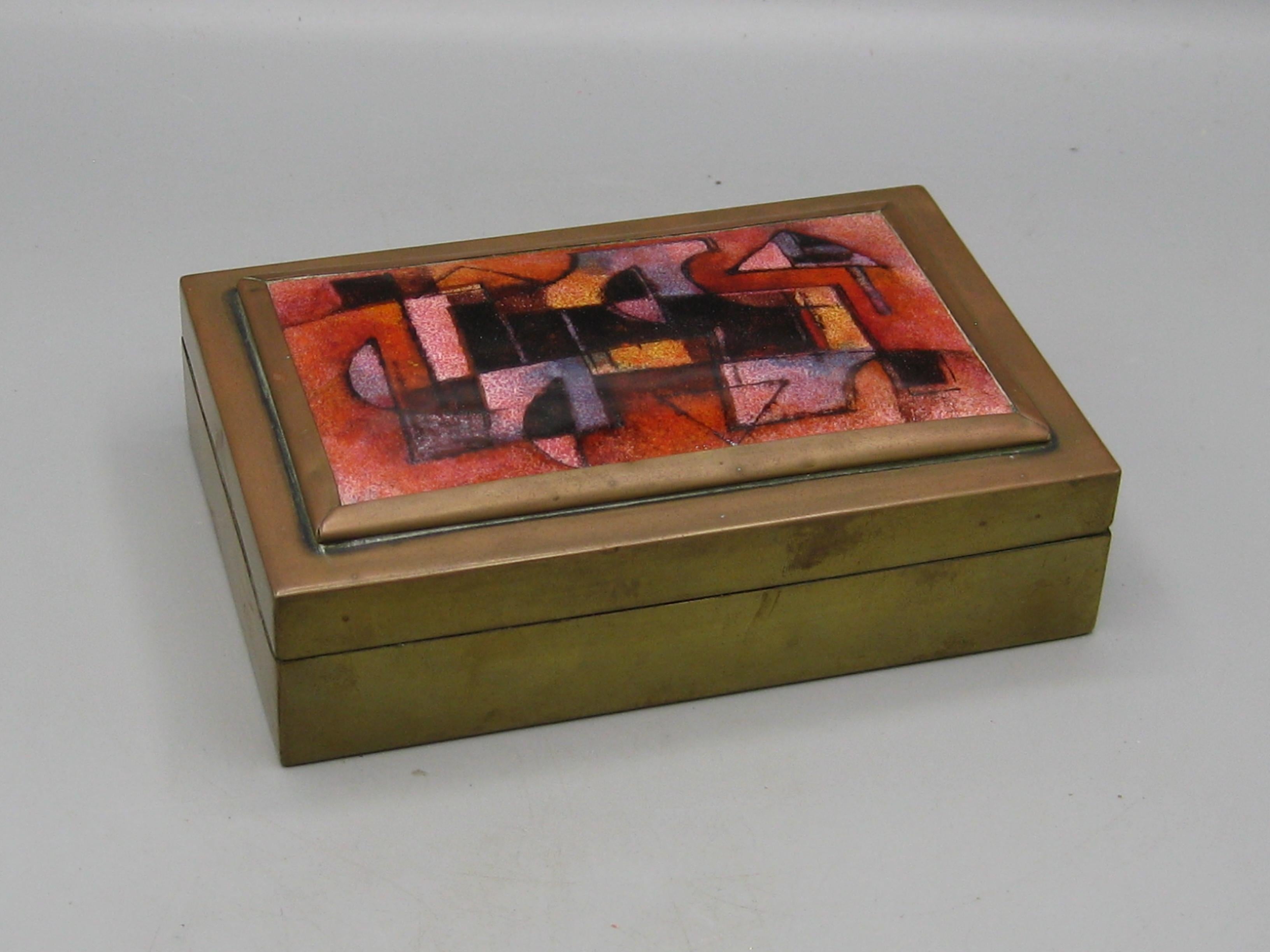 Beautiful abstract enamel on copper decorative handcrafted brass cigarette stash/trinket box by Karl Drerup. The box has a wonderful form and design. Marked on the bottom with the initials 